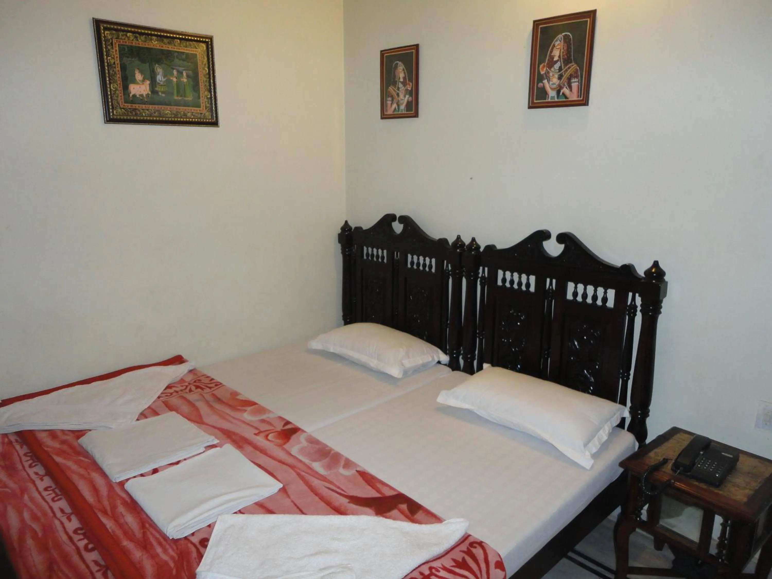 Photo of the whole room, Bed in Krishna Palace - A Heritage Boutique Hotel