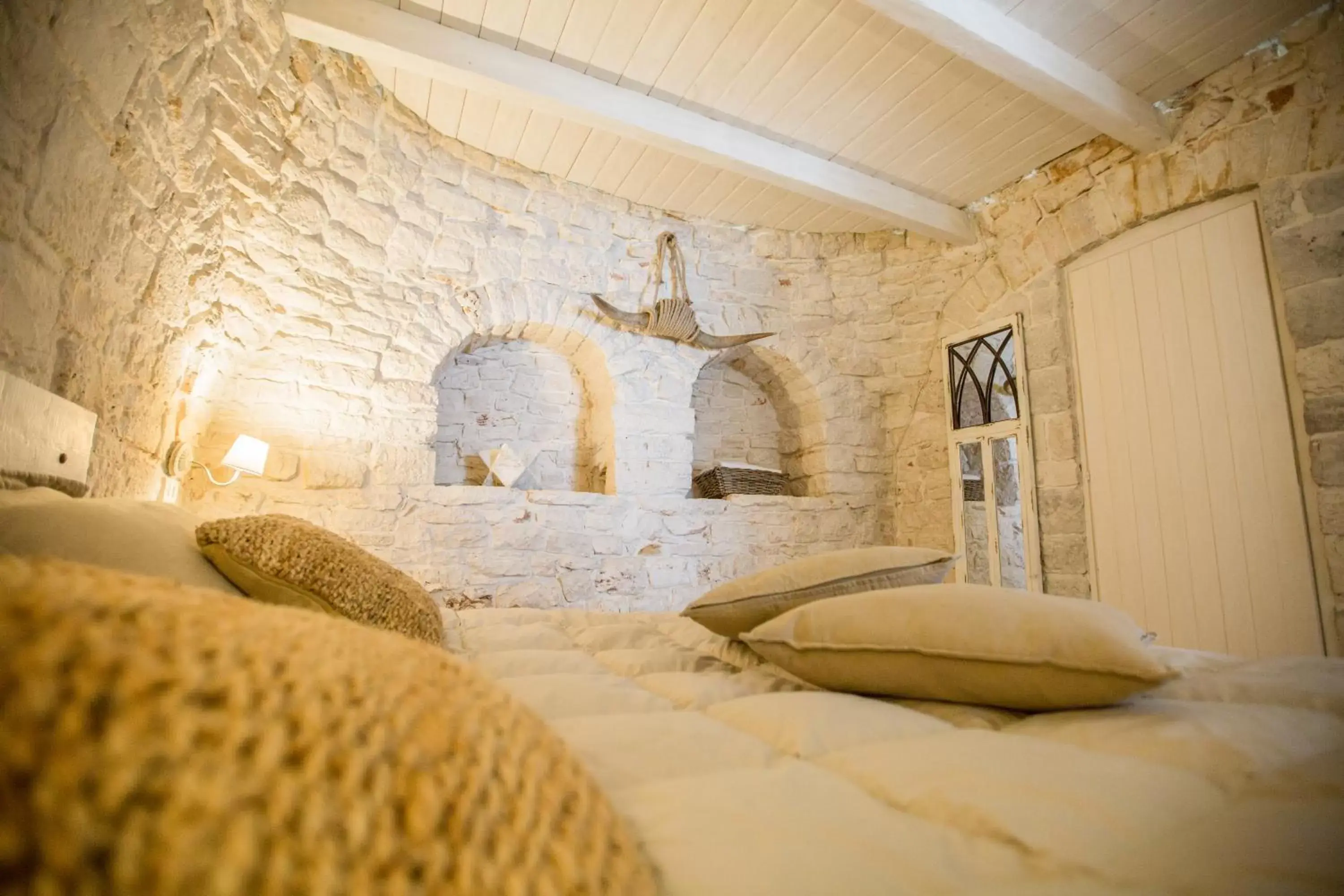 Bed in Trulli Antichi Mestieri - Widespread Trulli in the historic center