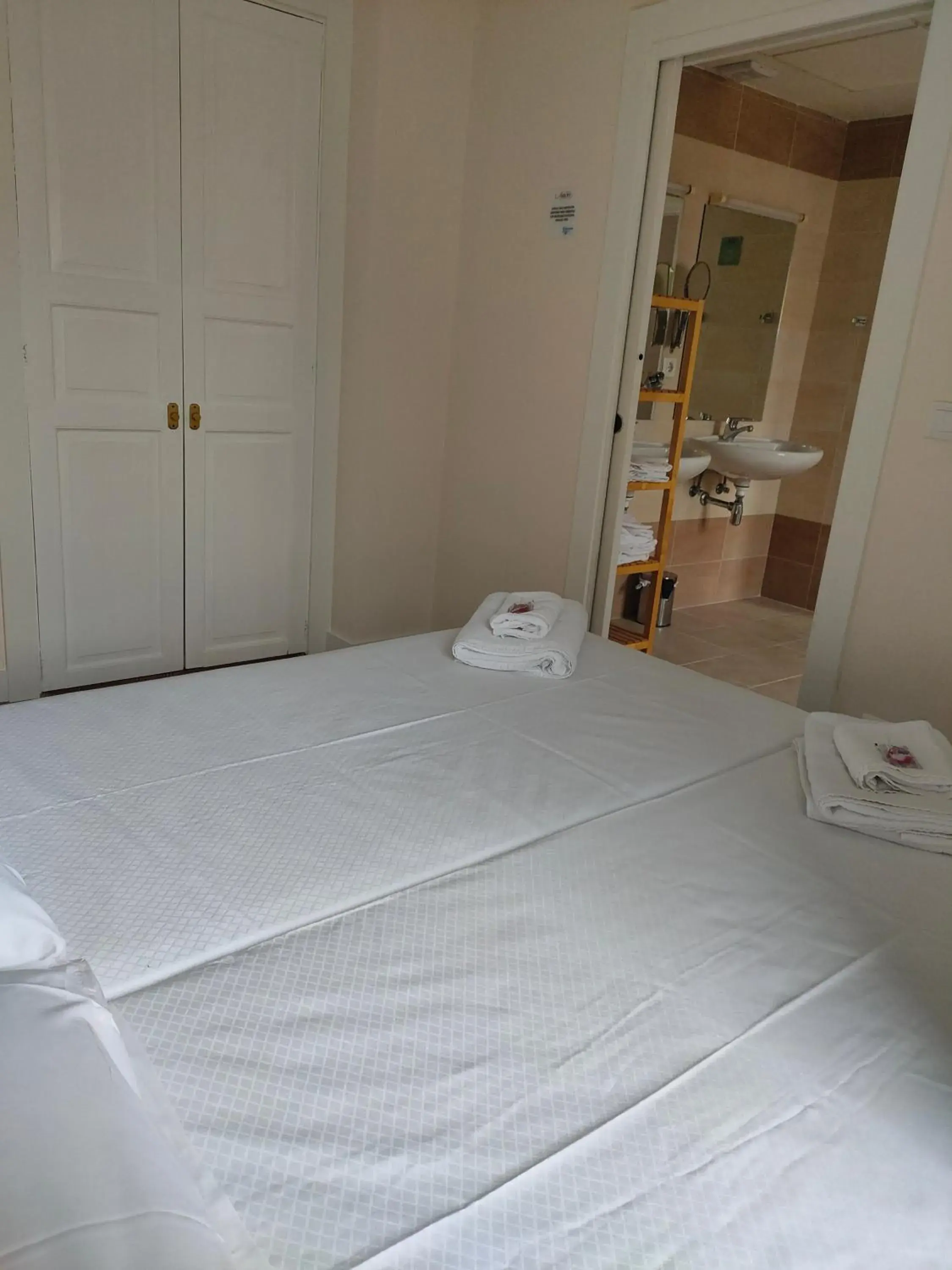 Bed in Hotel Arrope