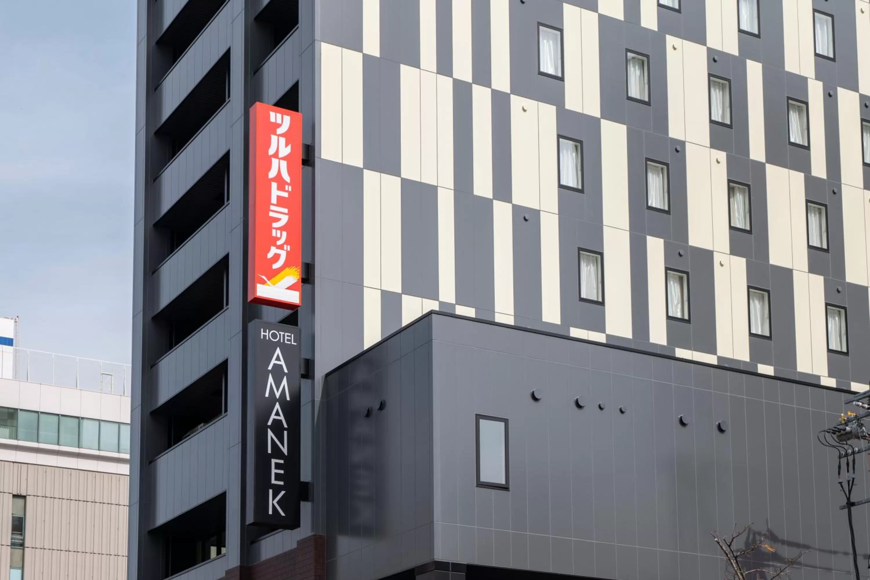 Property logo or sign in HOTEL AMANEK Asahikawa