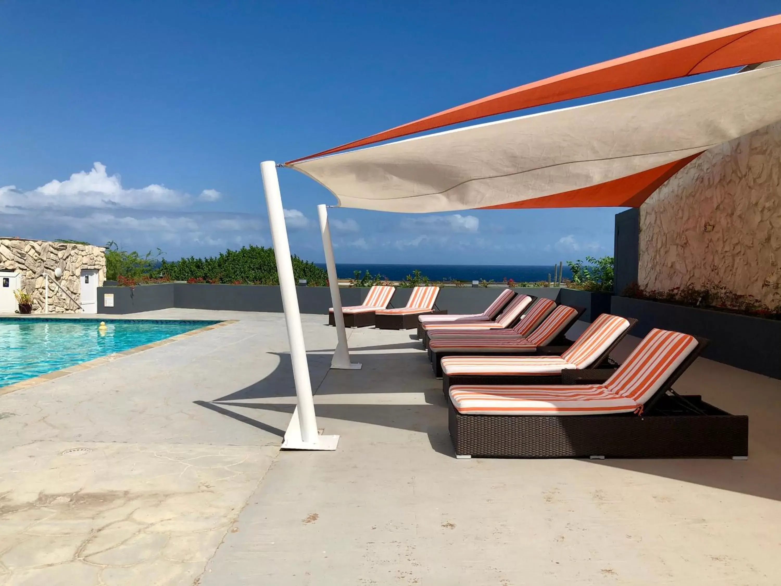 Balcony/Terrace, Swimming Pool in Curacao Airport Hotel