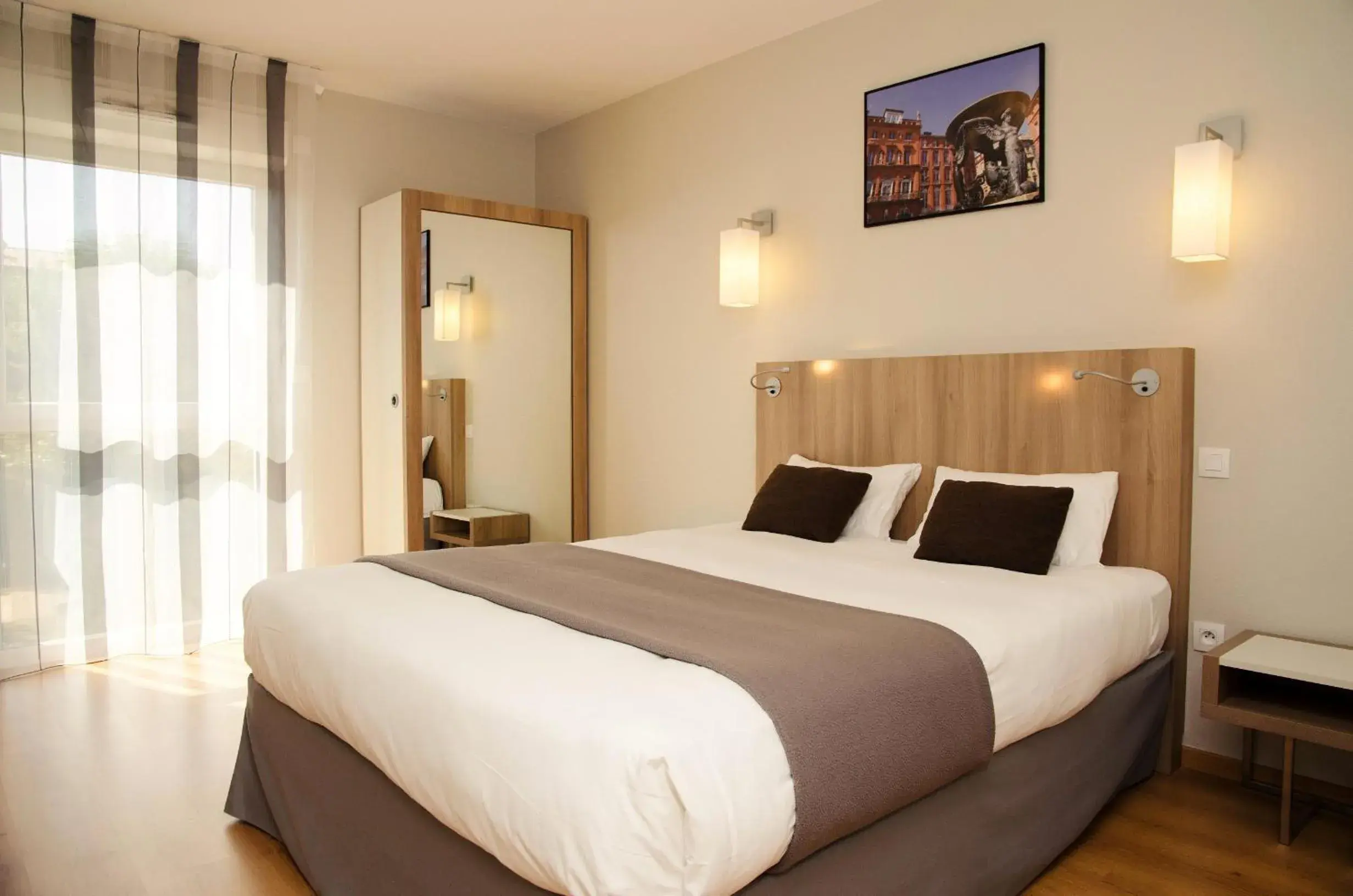 Bed in Lagrange Aparthotel Toulouse Saint-Michel Bed in Lagrange Aparthotel Toulouse Saint-Michel