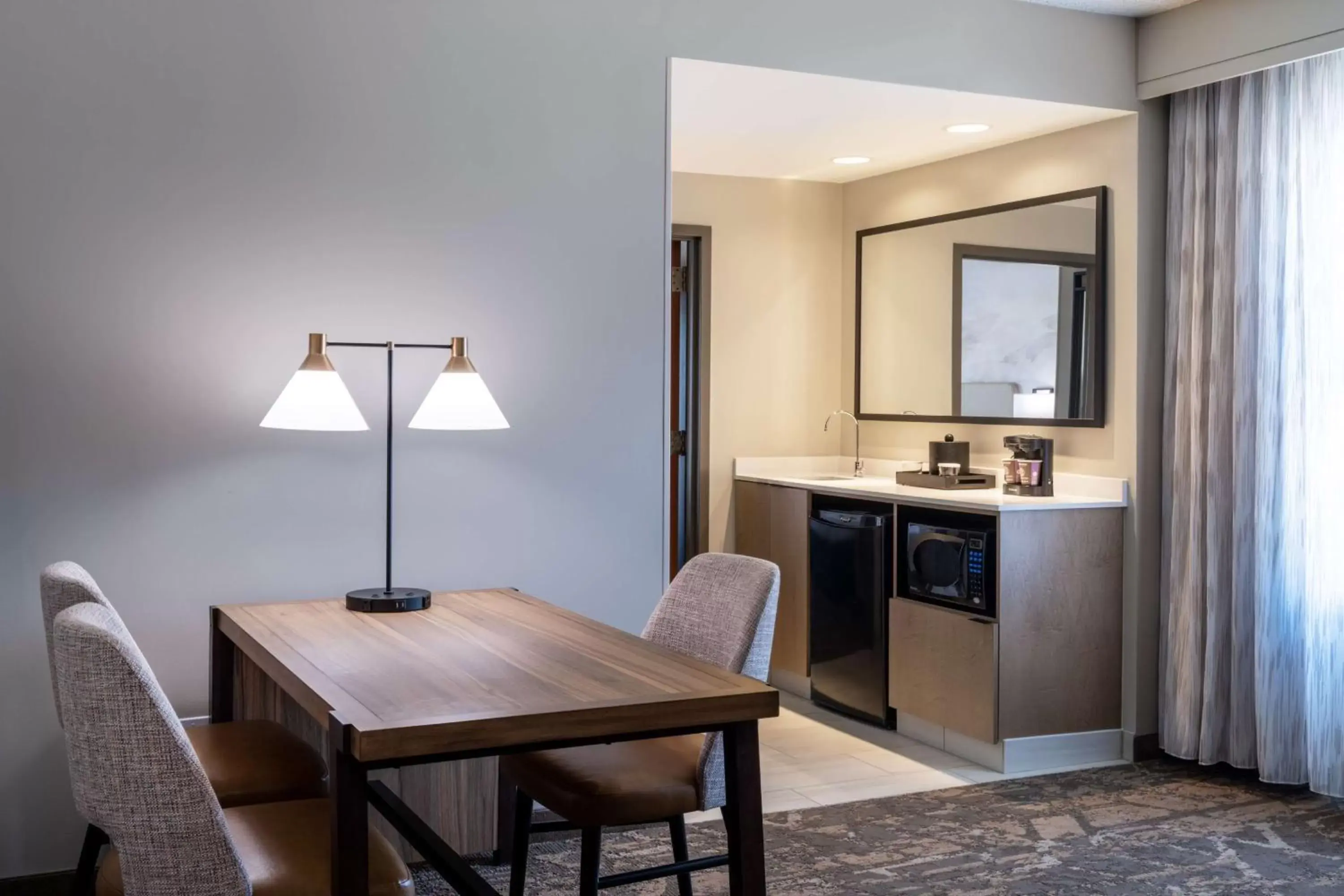Living room, Kitchen/Kitchenette in Embassy Suites by Hilton Albuquerque