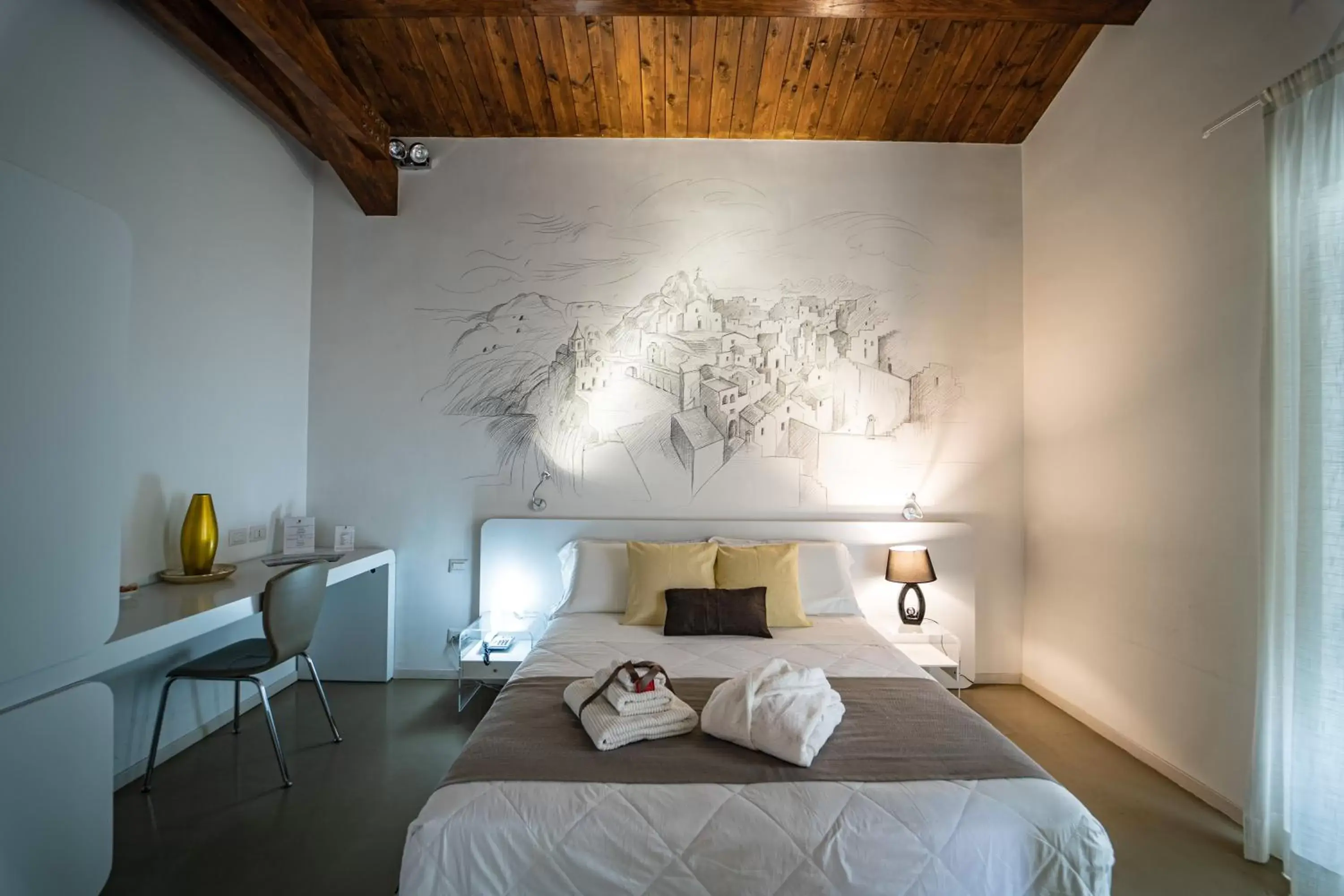 Bed in Hotel Cave Del Sole