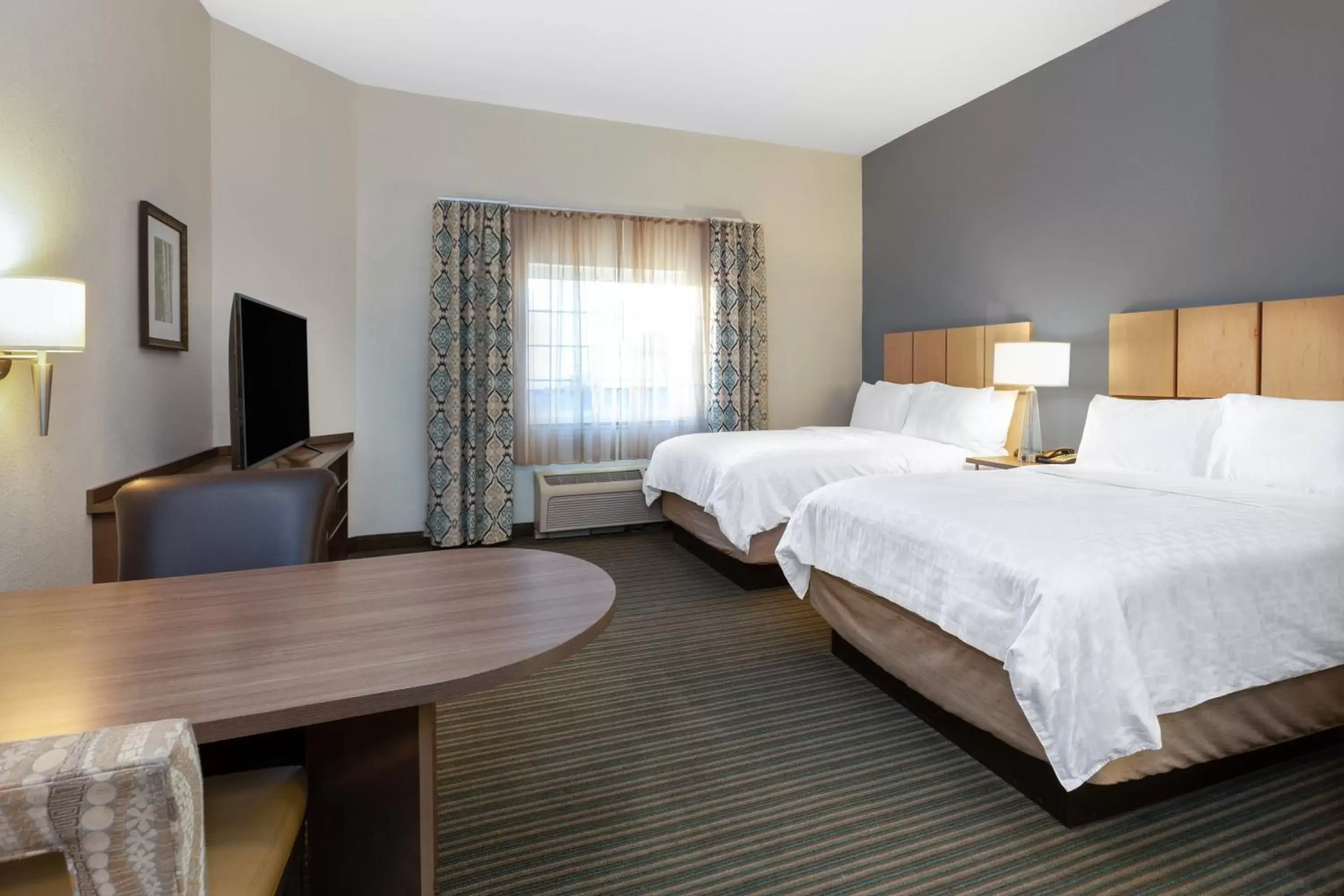 Photo of the whole room, Bed in Candlewood Suites-West Springfield, an IHG Hotel