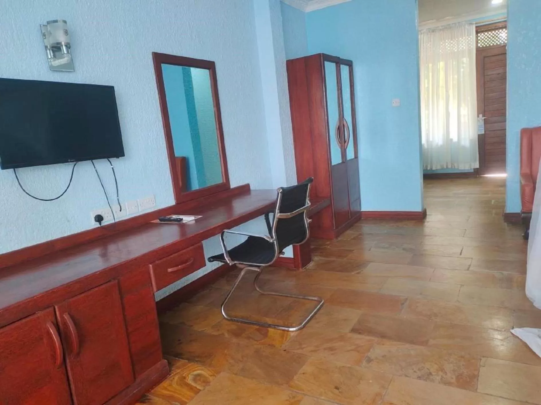 View (from property/room), TV/Entertainment Center in Serene Beach Resort