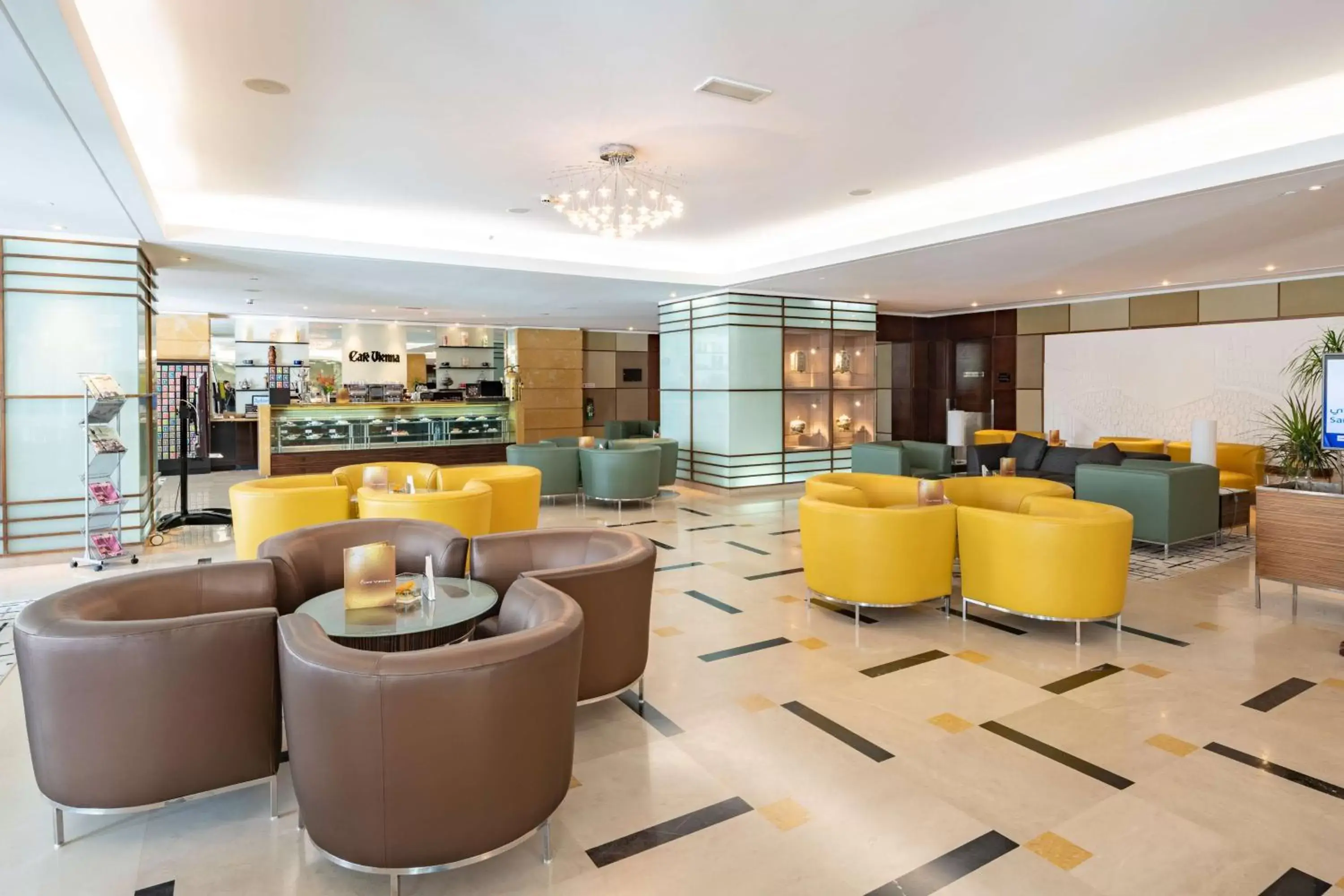 Lobby or reception, Lounge/Bar in Radisson Blu Hotel, Riyadh