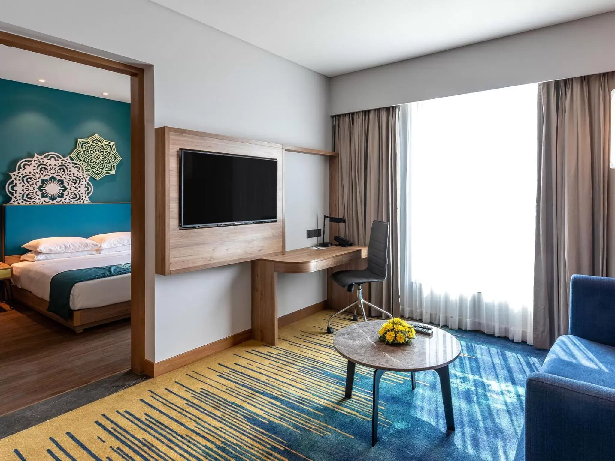 Living room, TV/Entertainment Center in Grand Mercure Gandhinagar GIFT City - An Accor Hotels Brand