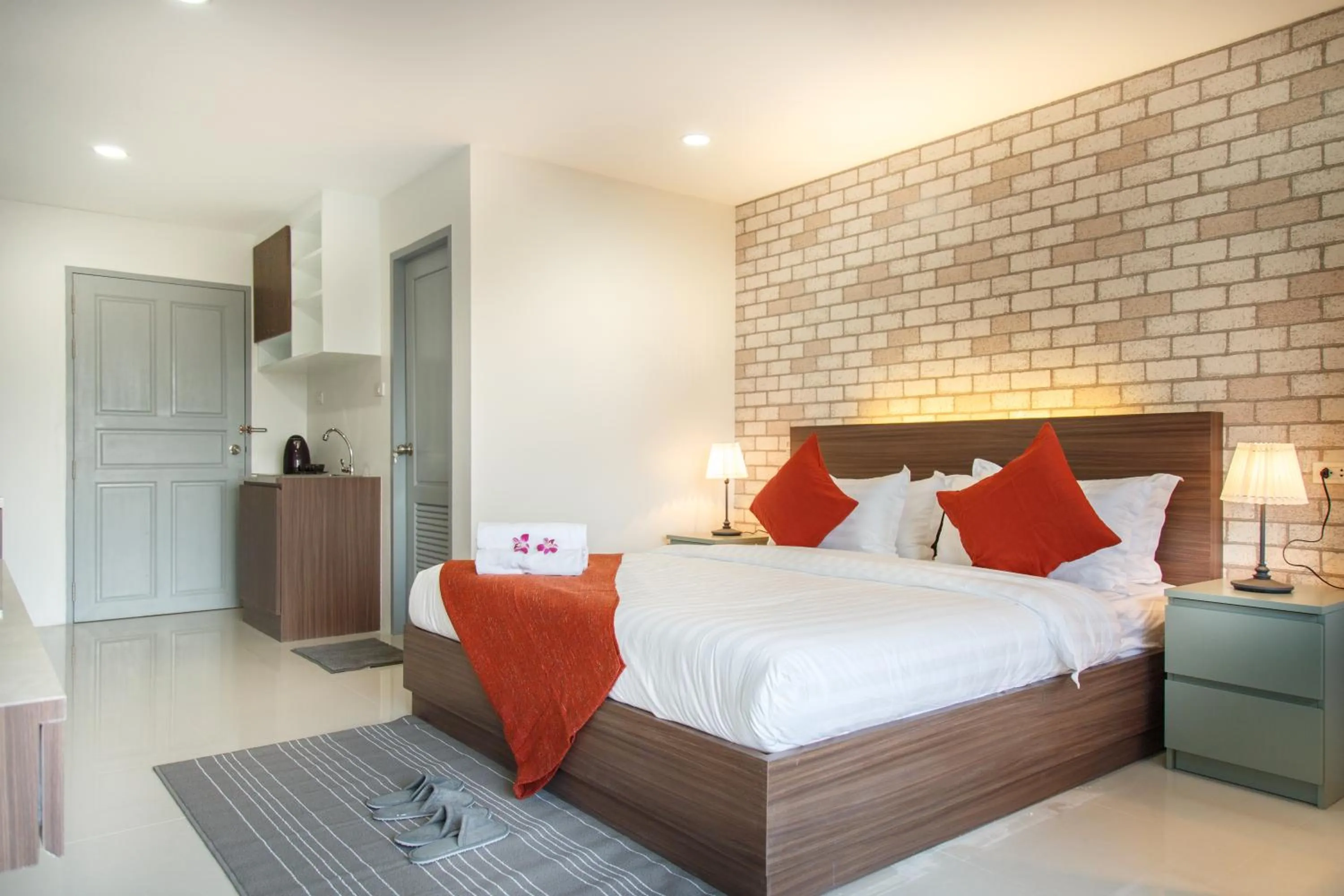 Bed in Q Space Residence