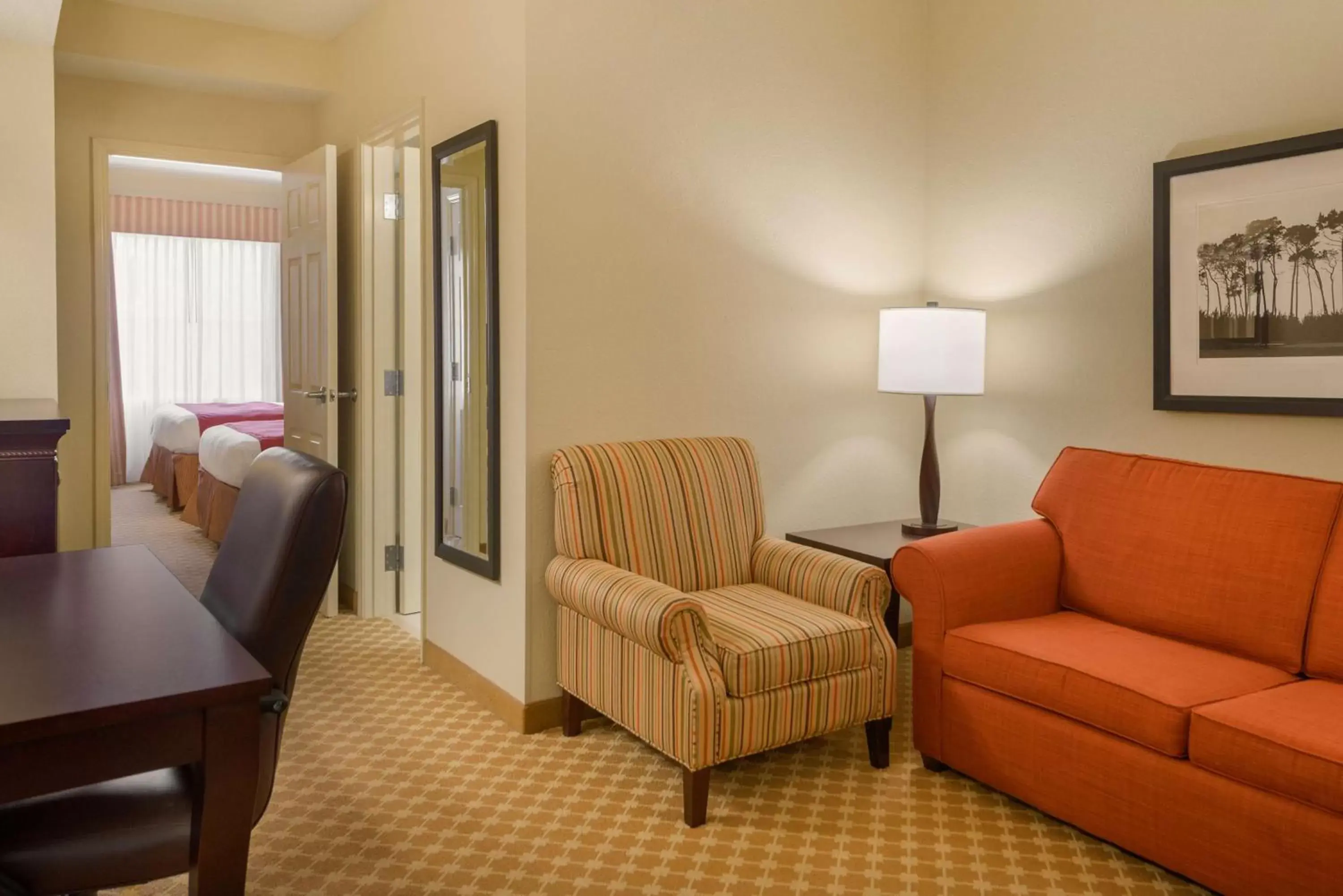 Photo of the whole room, Seating Area in Country Inn & Suites by Radisson, Port Orange-Daytona, FL