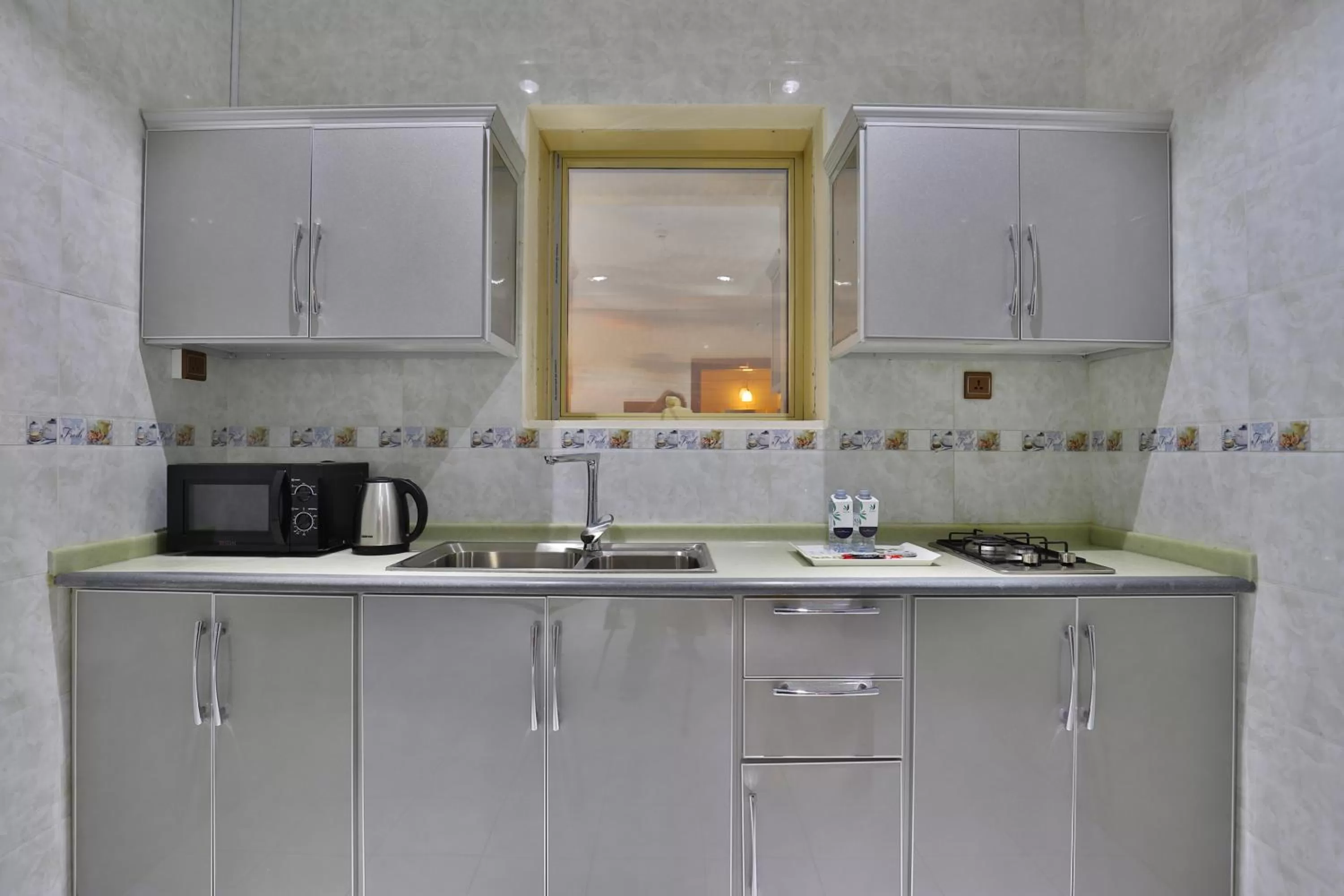 Kitchen or kitchenette in Dreams Houses Serviced Apartments