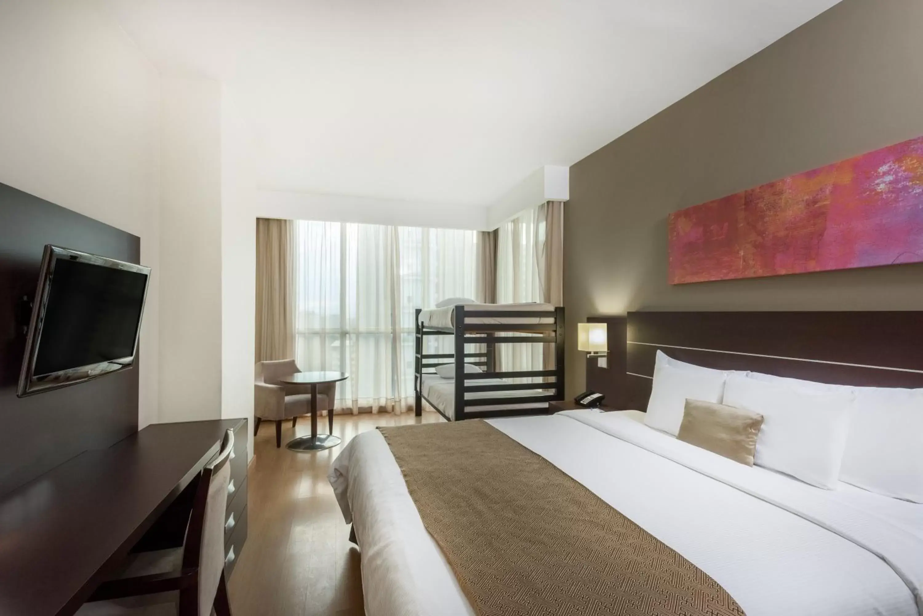 bunk bed, TV/Entertainment Center in Tryp by Wyndham Panama Centro