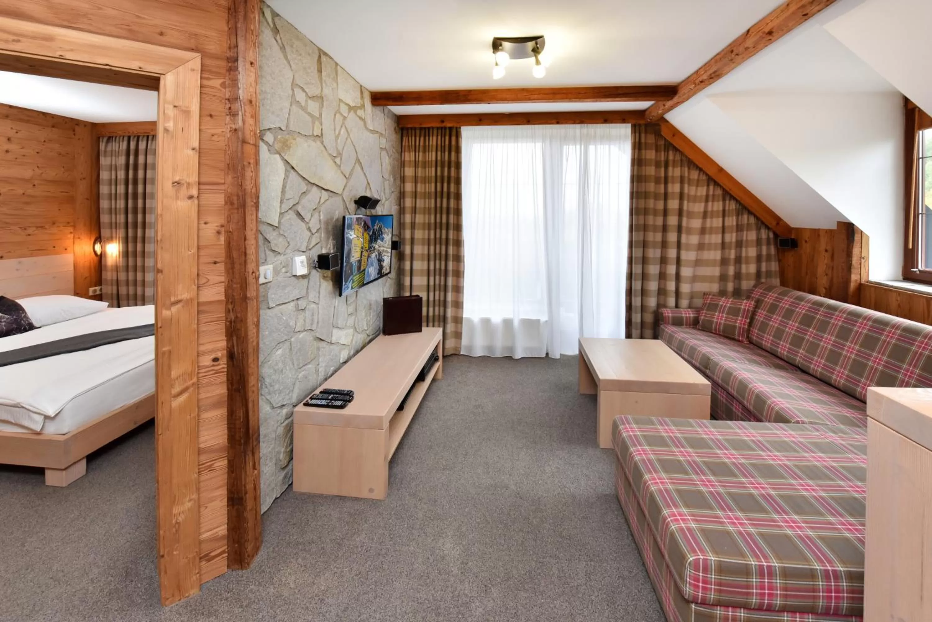 Seating area, Bed in APLEND Hotel Kukučka