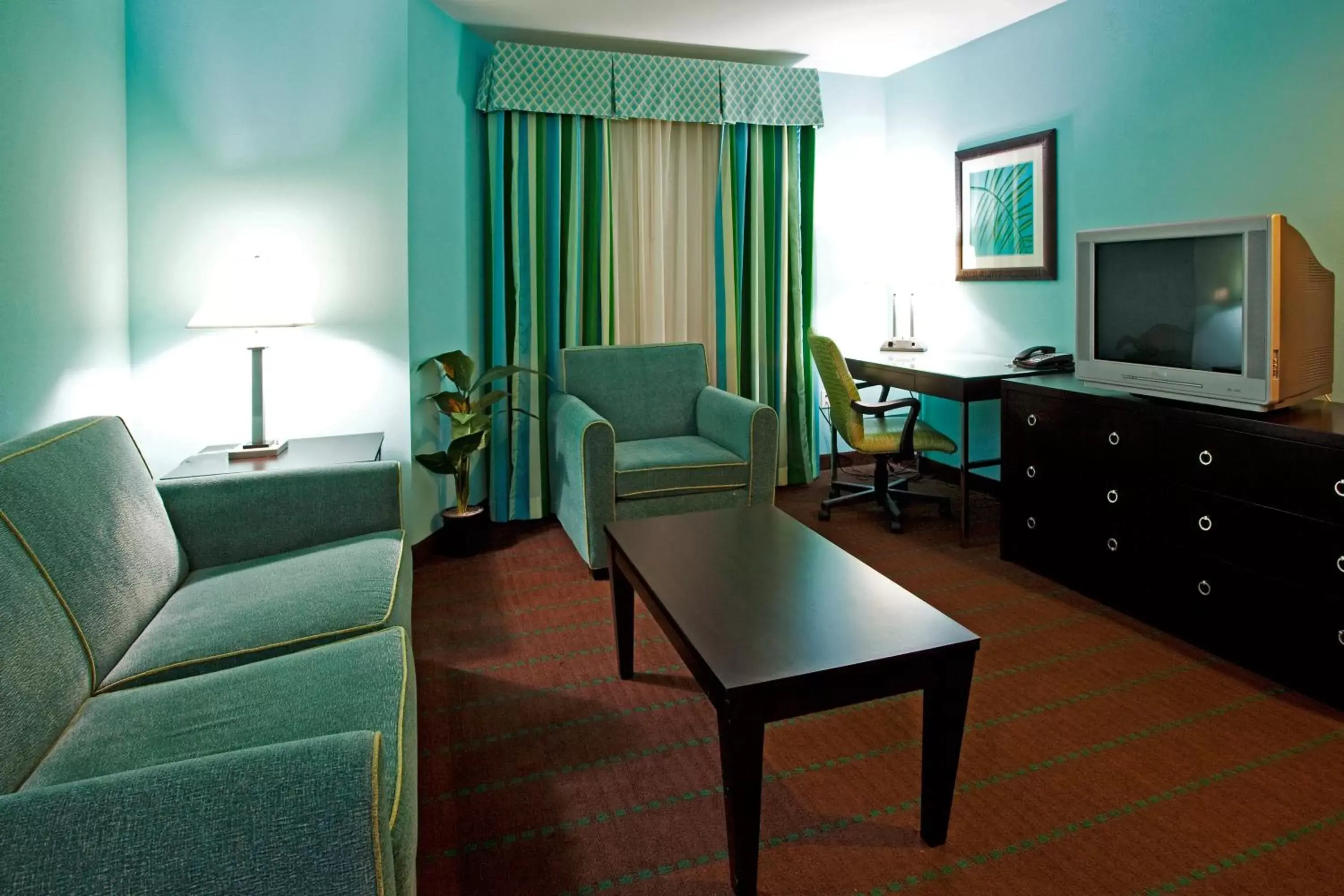 Photo of the whole room, Seating Area in Holiday Inn Hotel & Suites Ocala Conference Center, an IHG Hotel