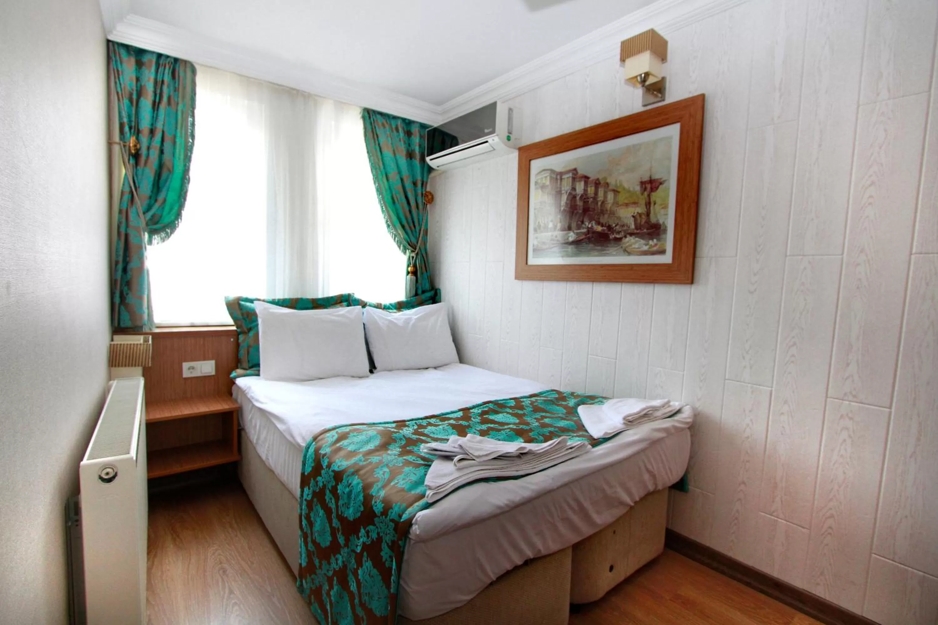 Bed in Agora Boutique Hotel & Bistro