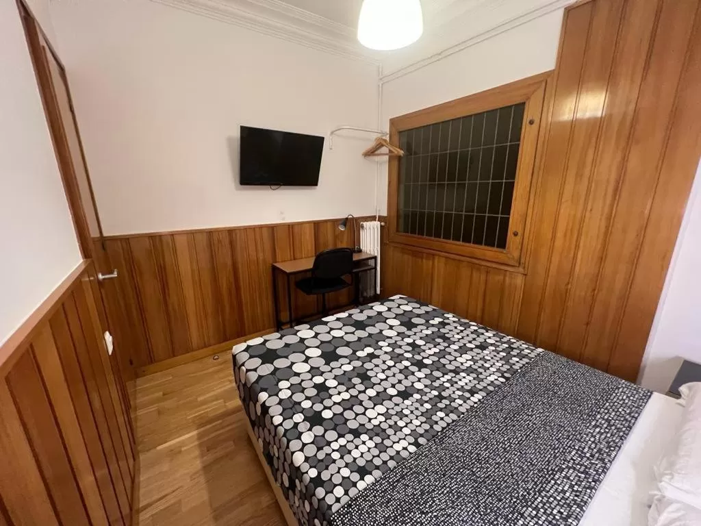 Bed in Nuevo Balmes Habitaciones