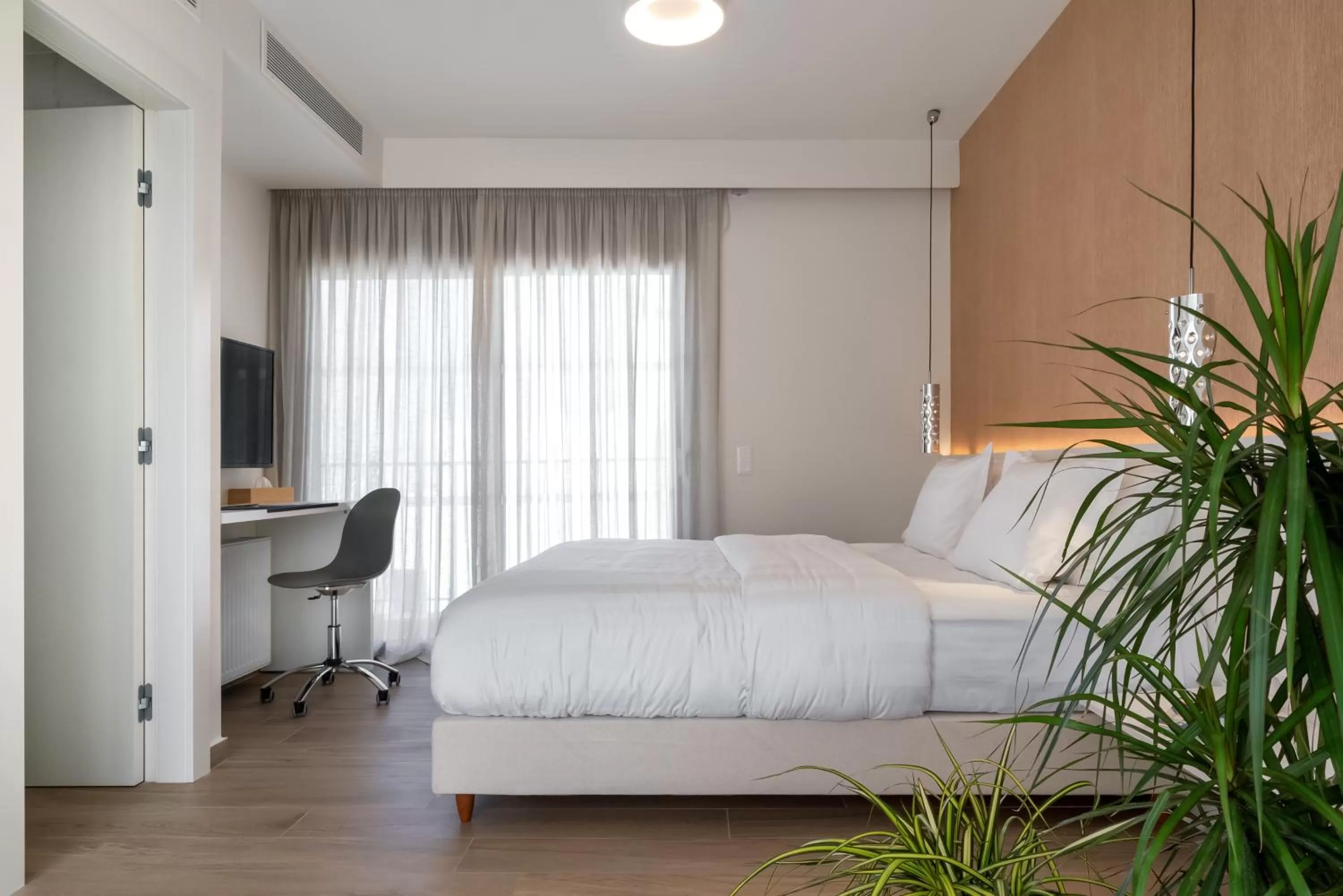 Bed in Athens Hill Luxury Apartments