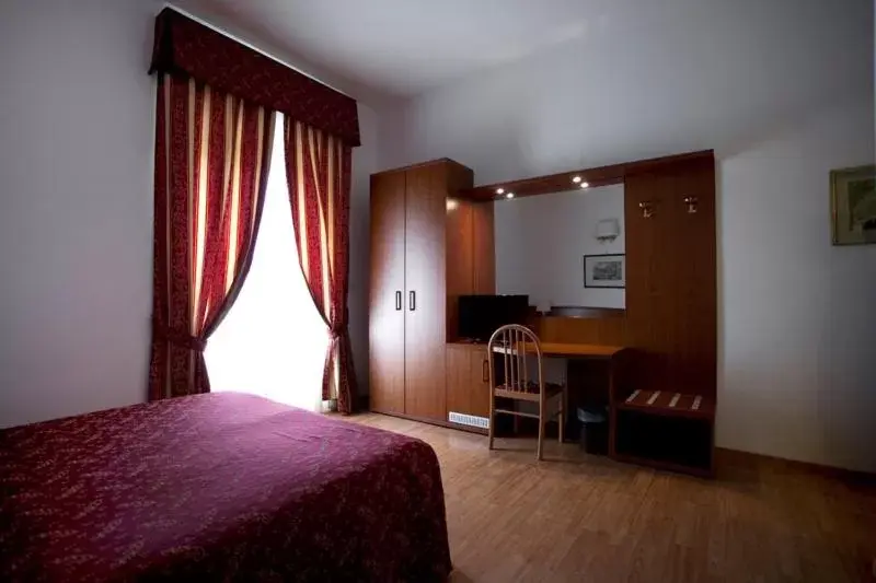 Bedroom, TV/Entertainment Center in Domus Appia 154 B&B
