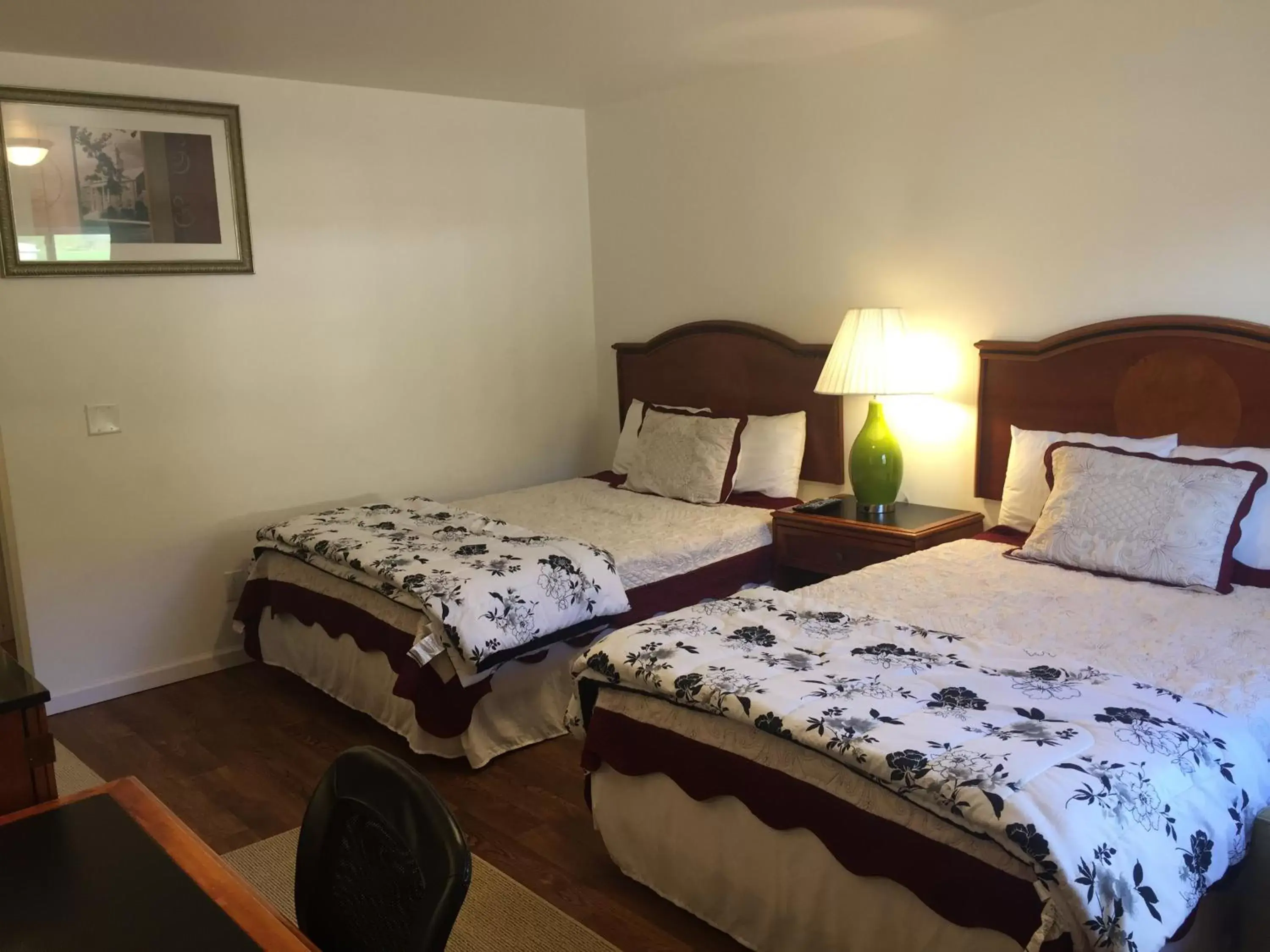 Bed in Apple Inn and Suites Cooperstown Area