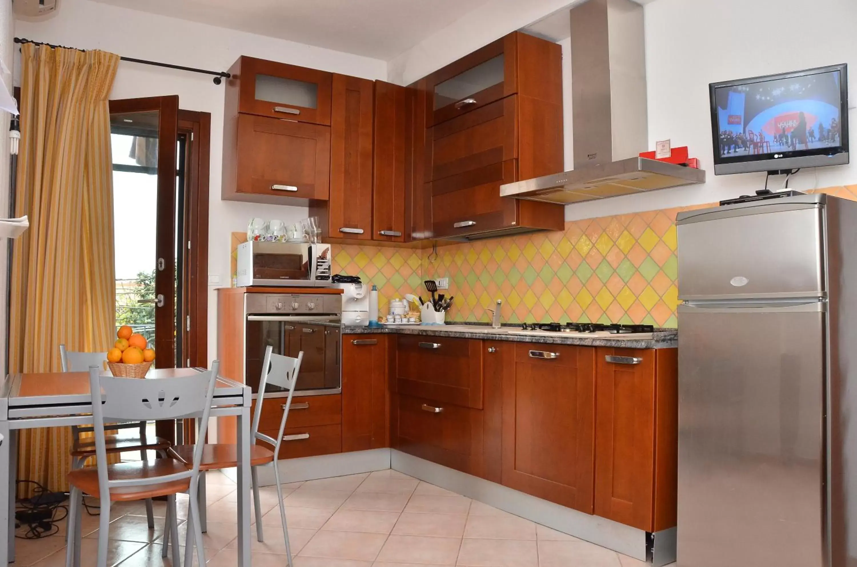 Kitchen/Kitchenette in Domo - Guest-House Il Nespolo Fiorito