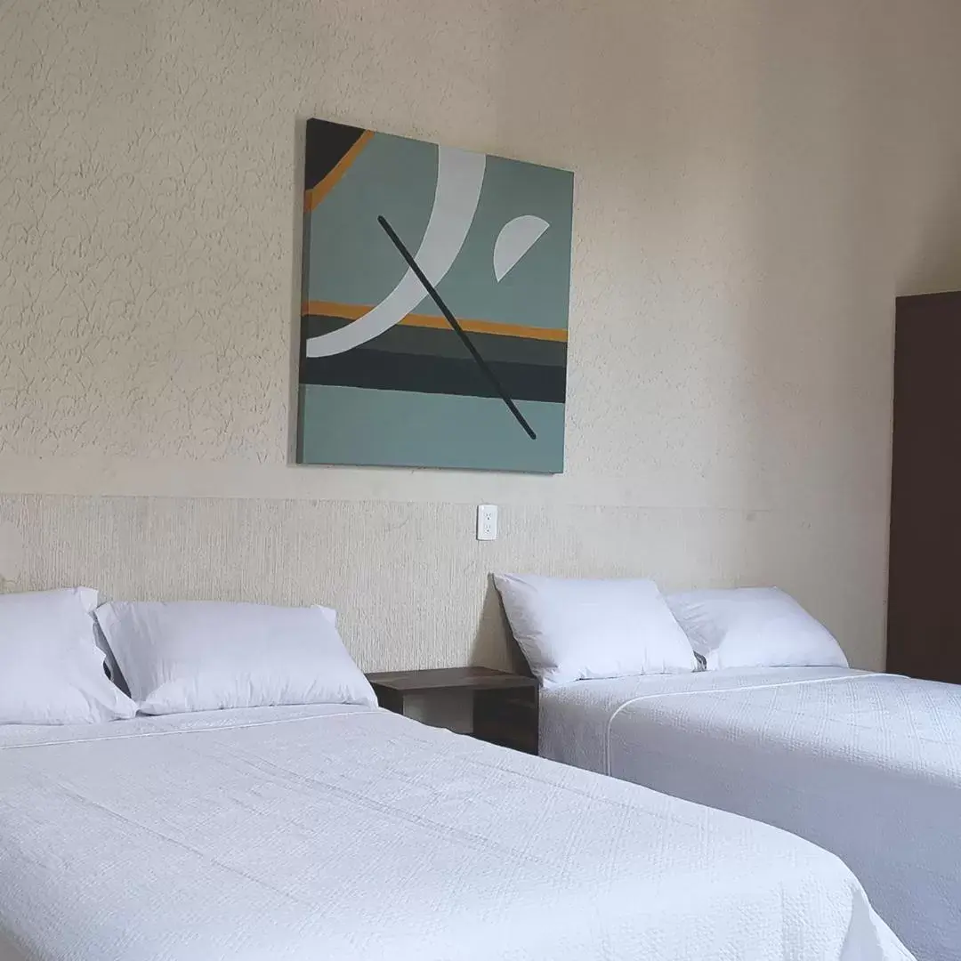 Standard Quadruple Room in Hotel Grand Isitia Standard Quadruple Room in Hotel Grand Isitia