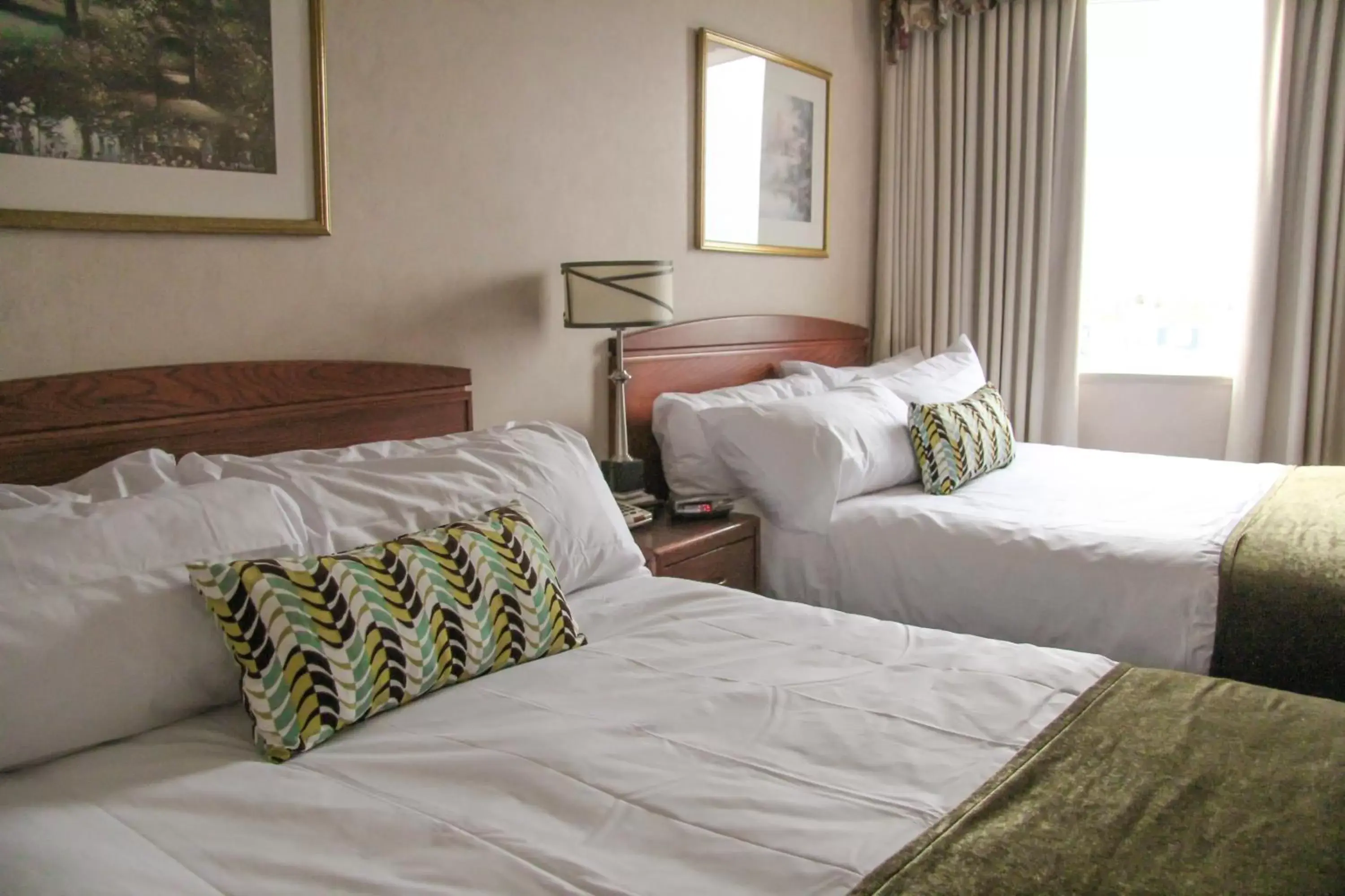 Bed in Continental Inn & Suites