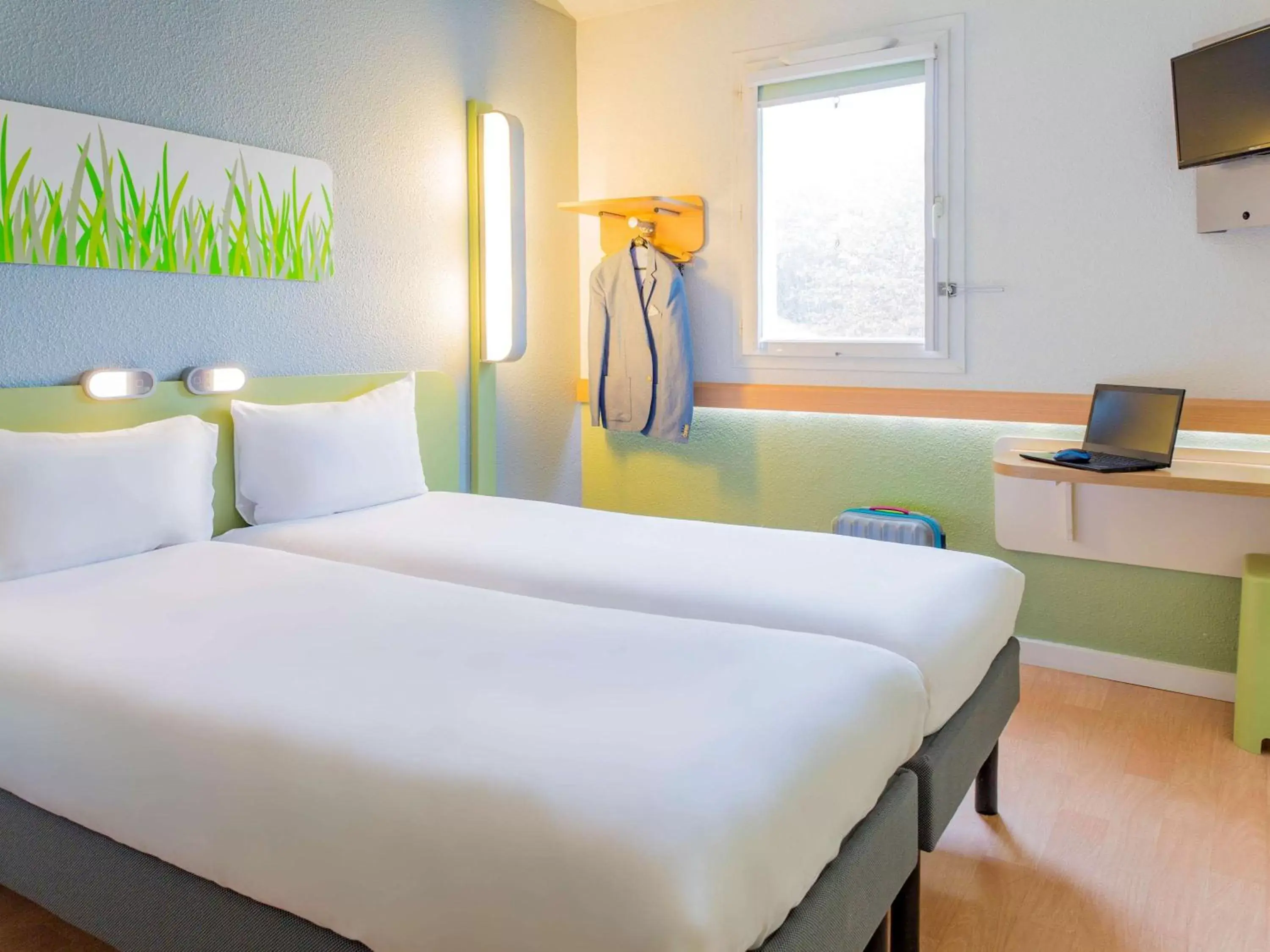 Photo of the whole room, Bed in ibis budget Nantes St Herblain