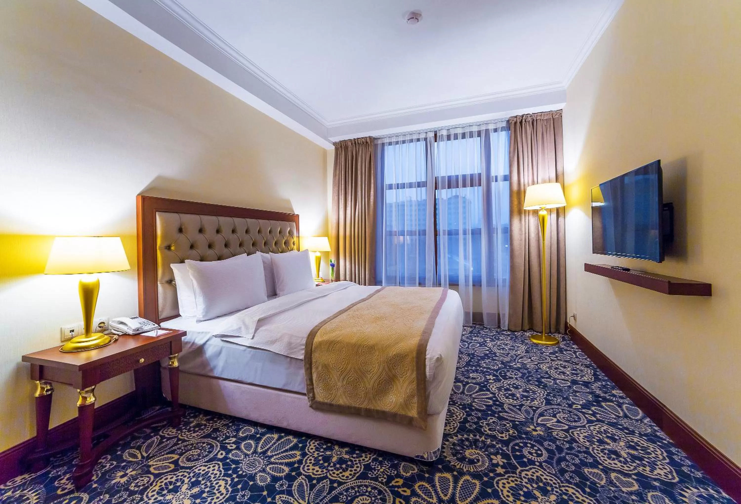 Bedroom, Bed in Ramada by Wyndham Almaty