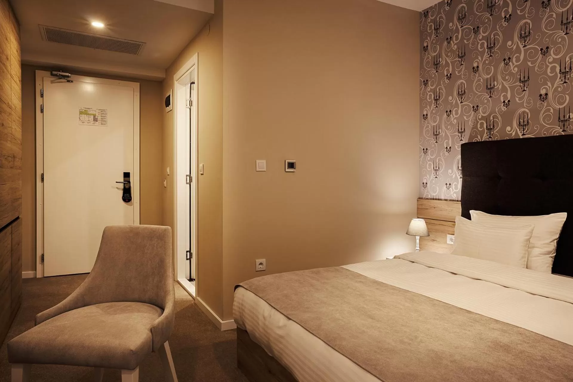 Photo of the whole room, Bed in IG Hotel