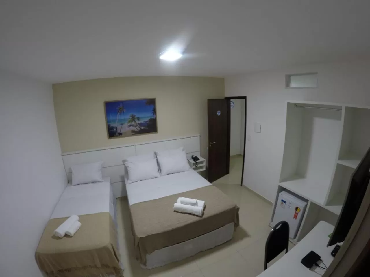 Bed in Pousada Kanoas