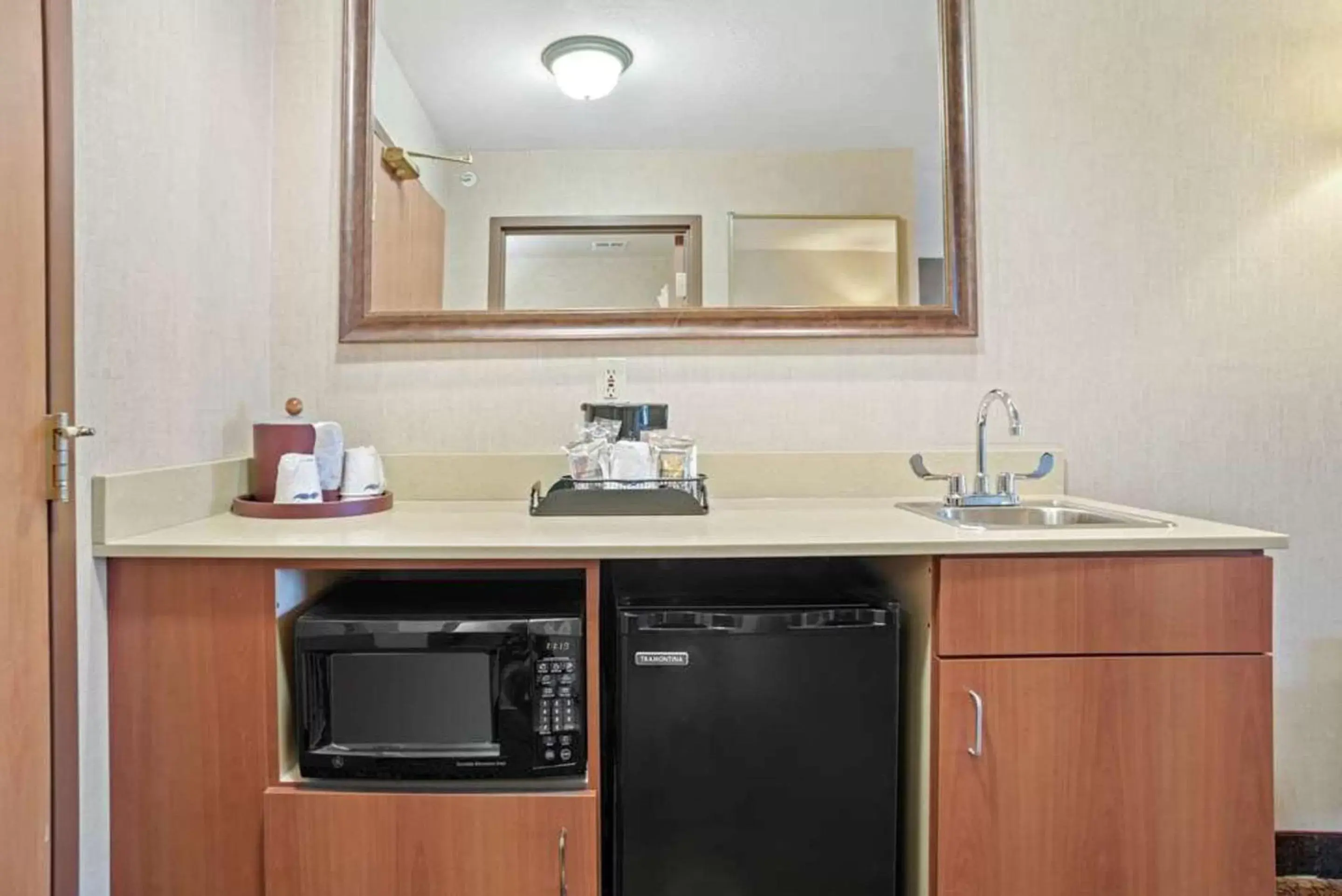 Kitchen or kitchenette, Bathroom in Comfort Inn & Suites Rapid City near Mt Rushmore