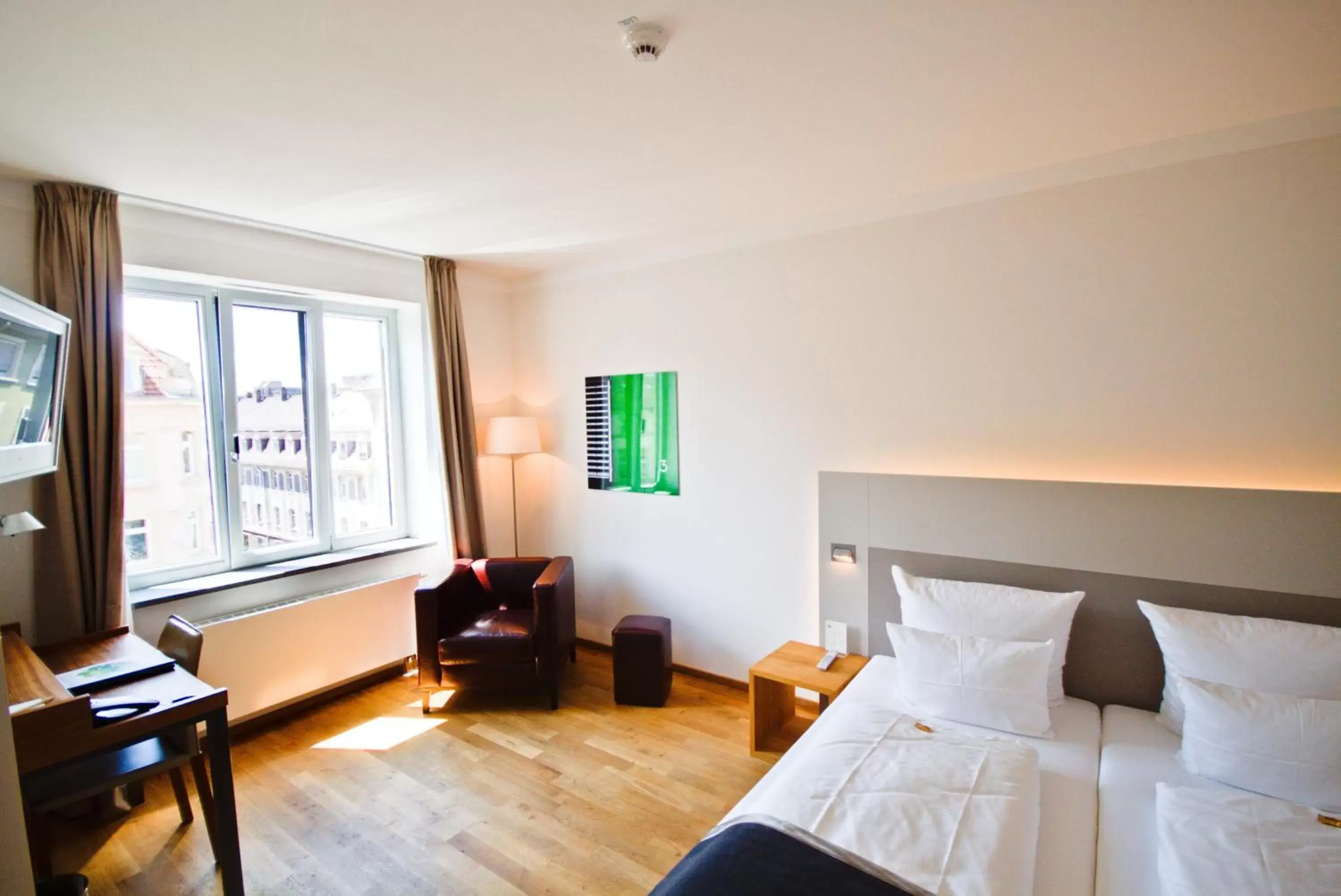 Photo of the whole room, Bed in Qube Hotel Bergheim