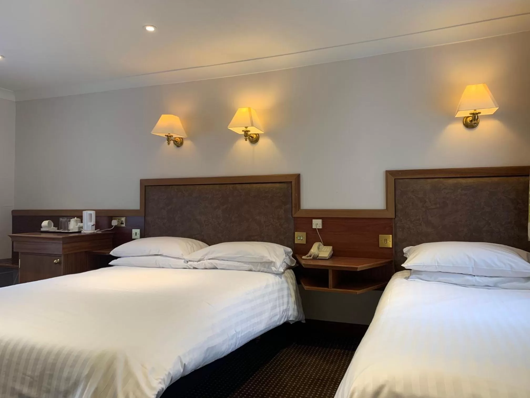 Bed in Littlebury Hotel