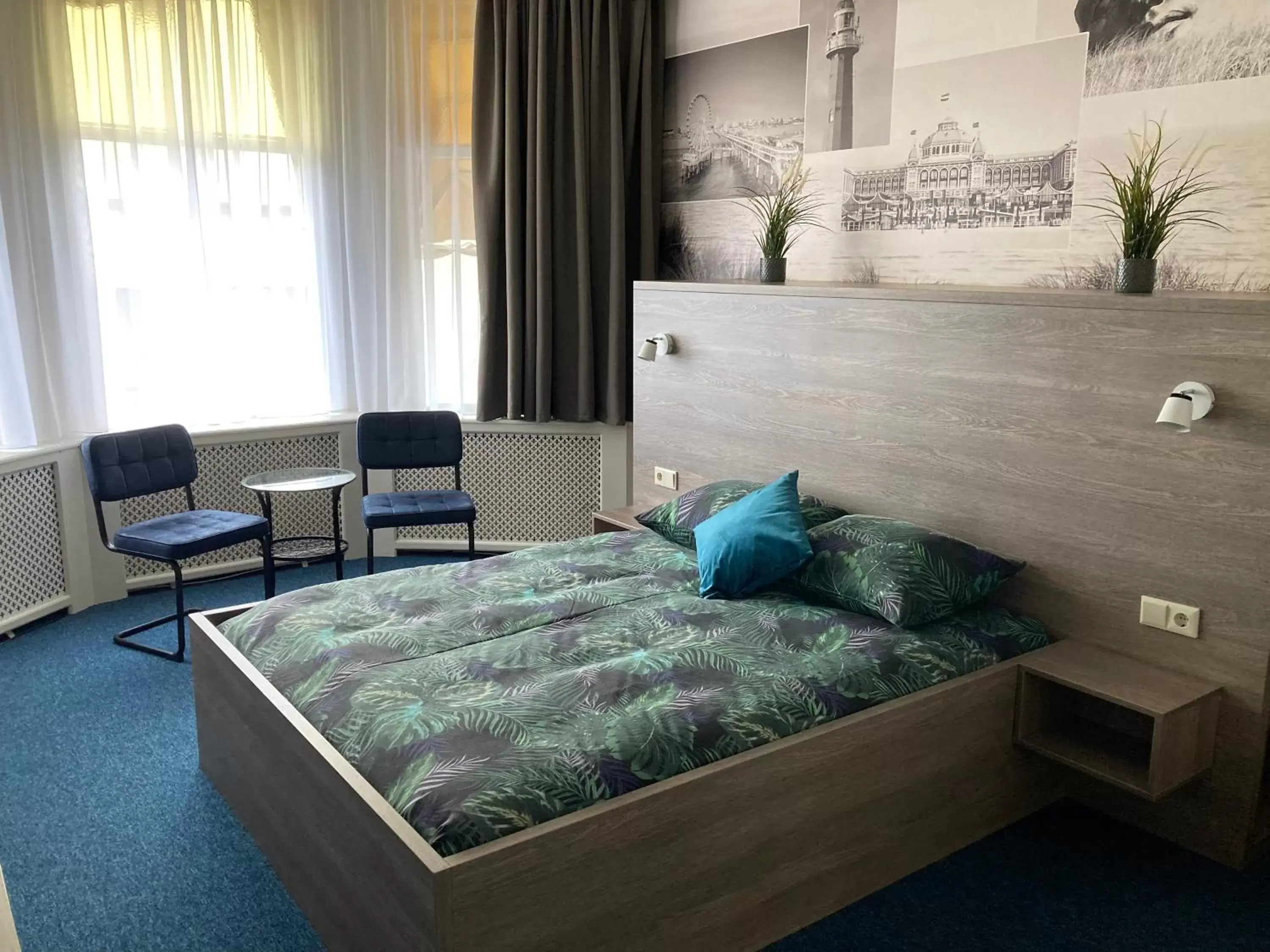Bed in Hotel Poseidon