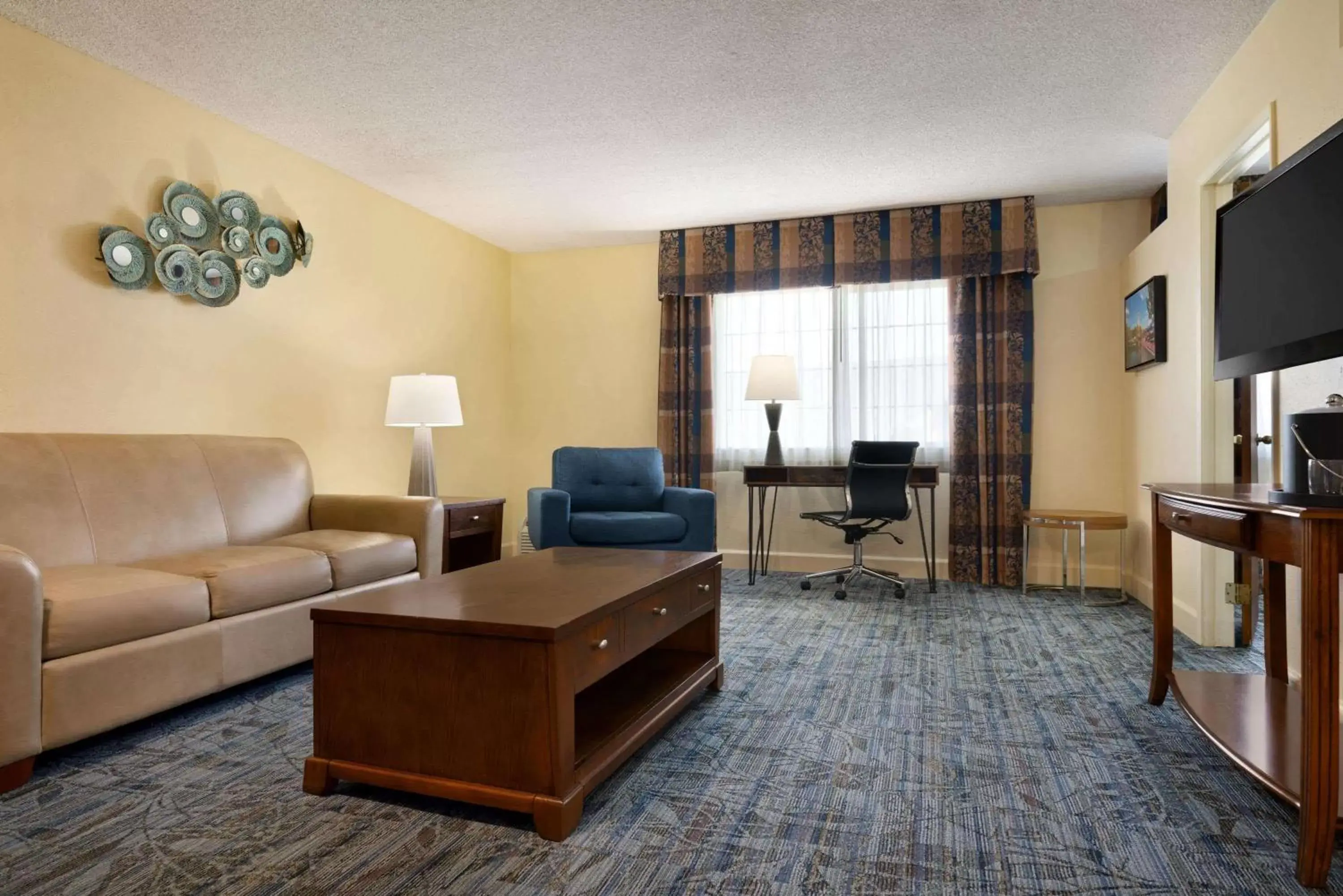 Photo of the whole room, Seating Area in Ramada by Wyndham Spokane Airport