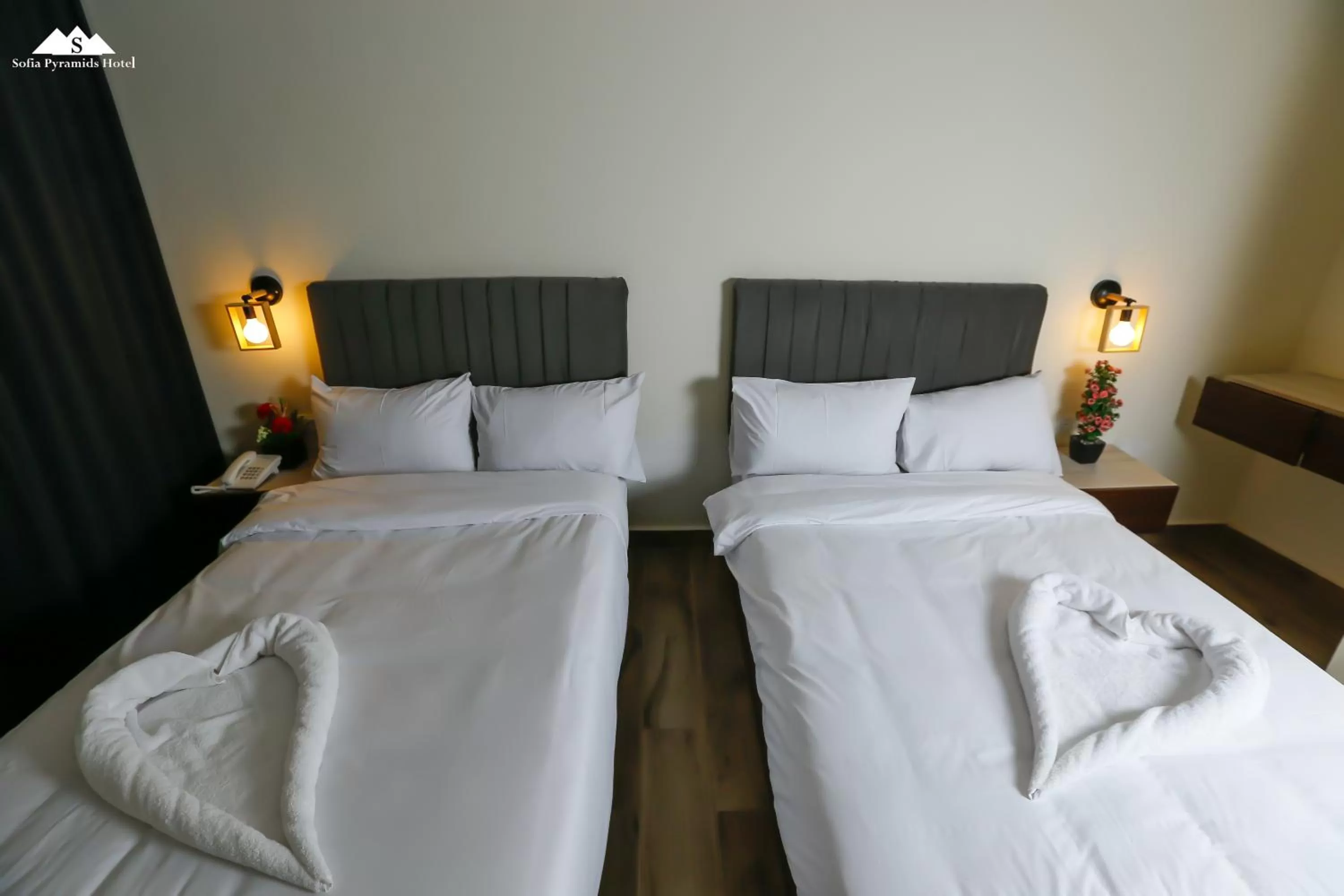 Bed in Sofia Pyramids Hotel