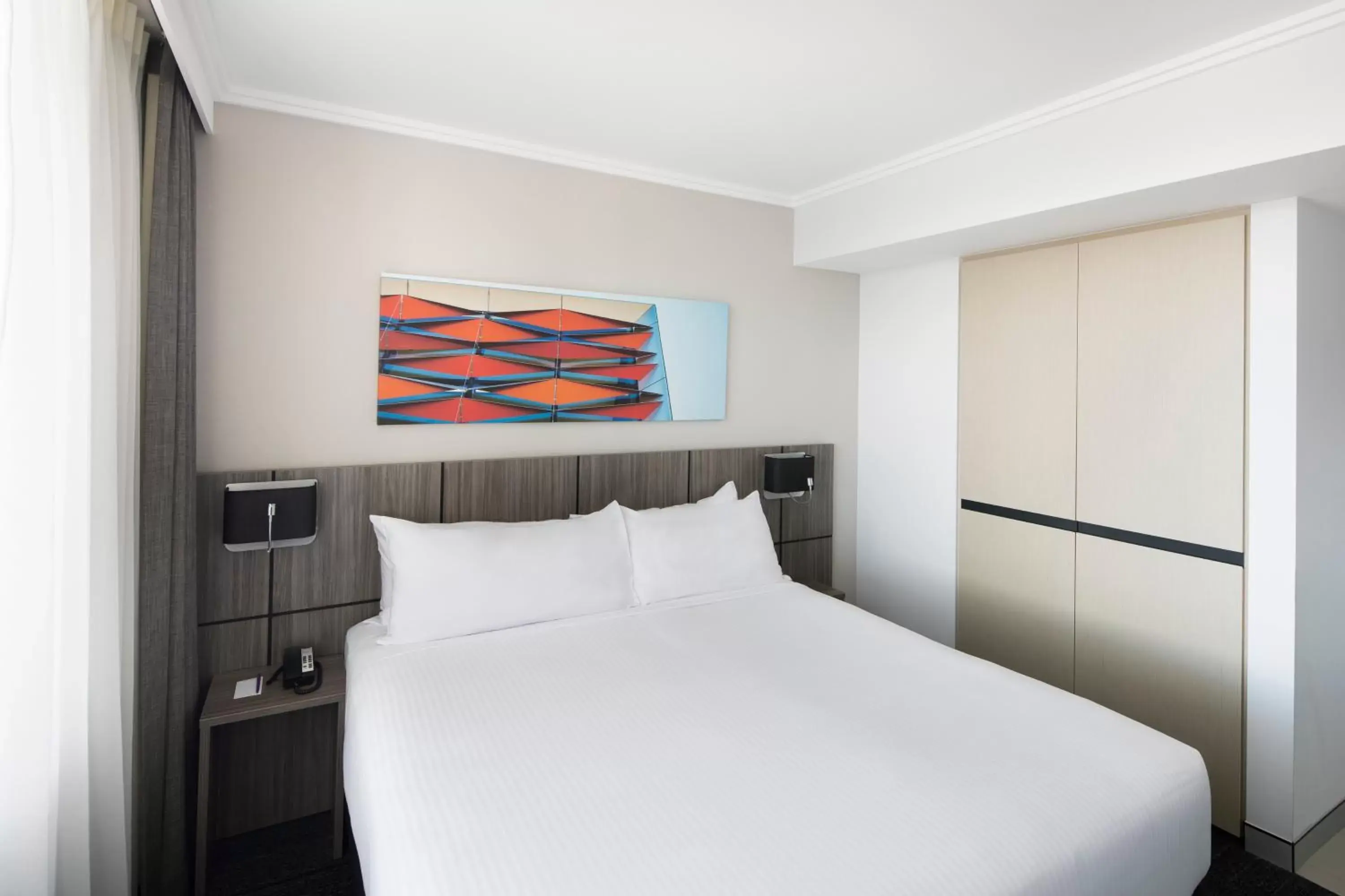 Bed in Mercure Sydney Bankstown