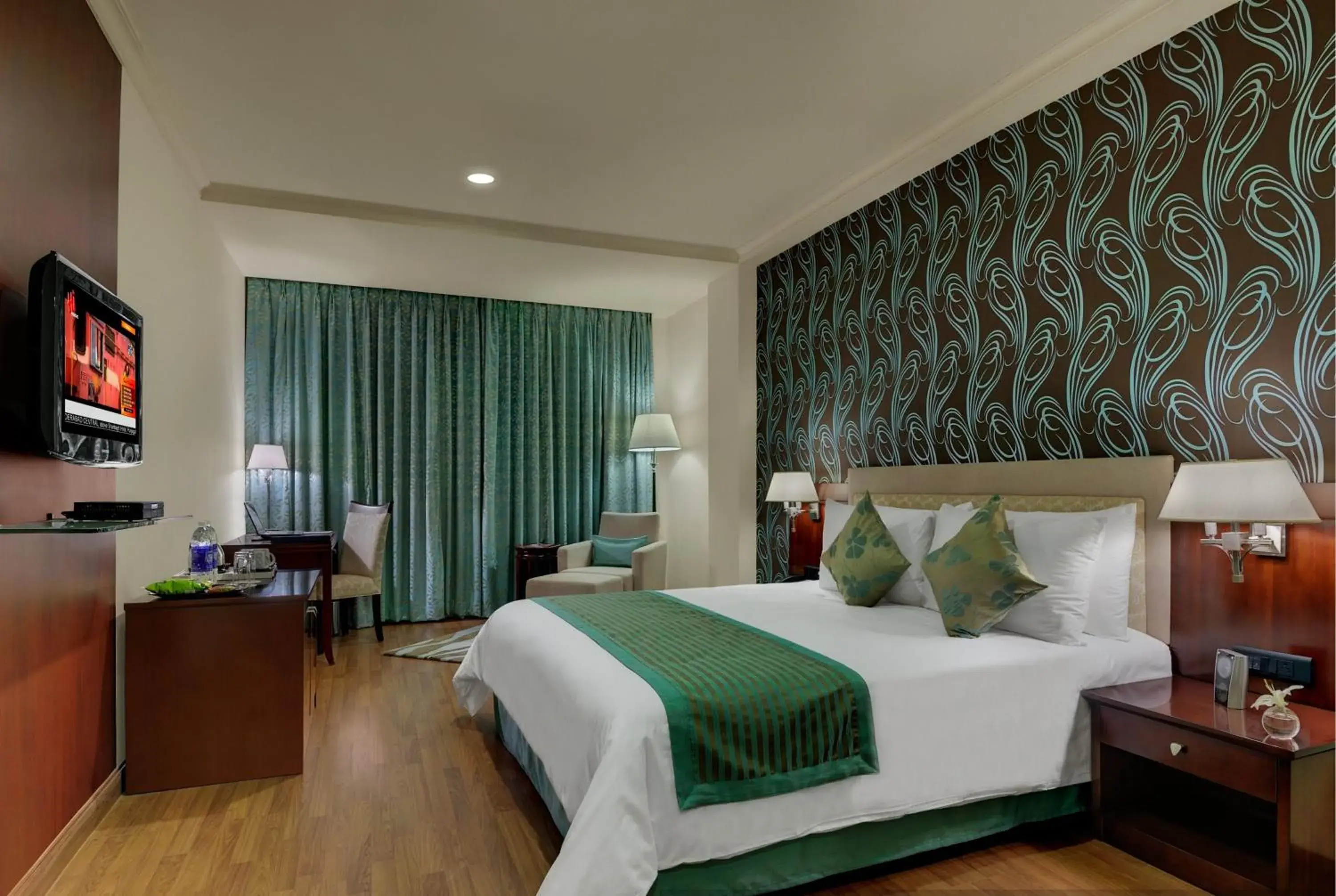 Photo of the whole room, Bed in Royalton Hyderabad Abids