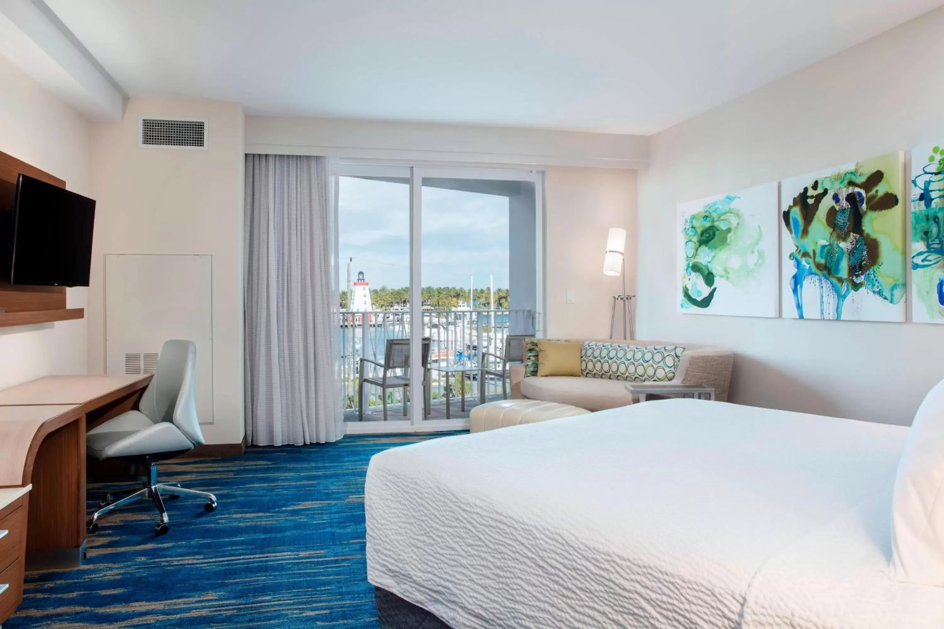 King Room with Sofa Bed and Partial Bay View in Courtyard by Marriott Faro Blanco Resort