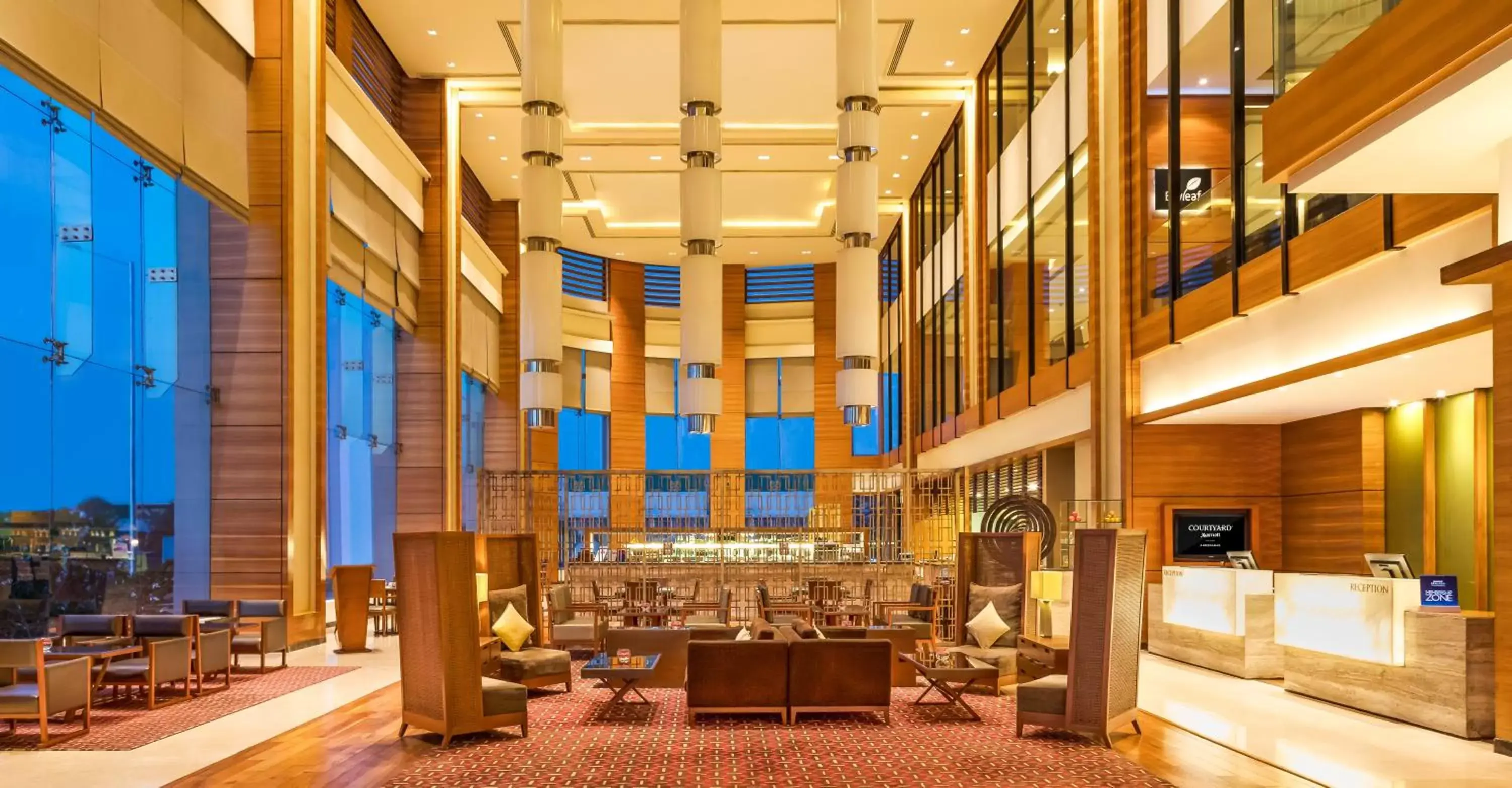 Seating area, Restaurant/Places to Eat in Courtyard by Marriott Ahmedabad