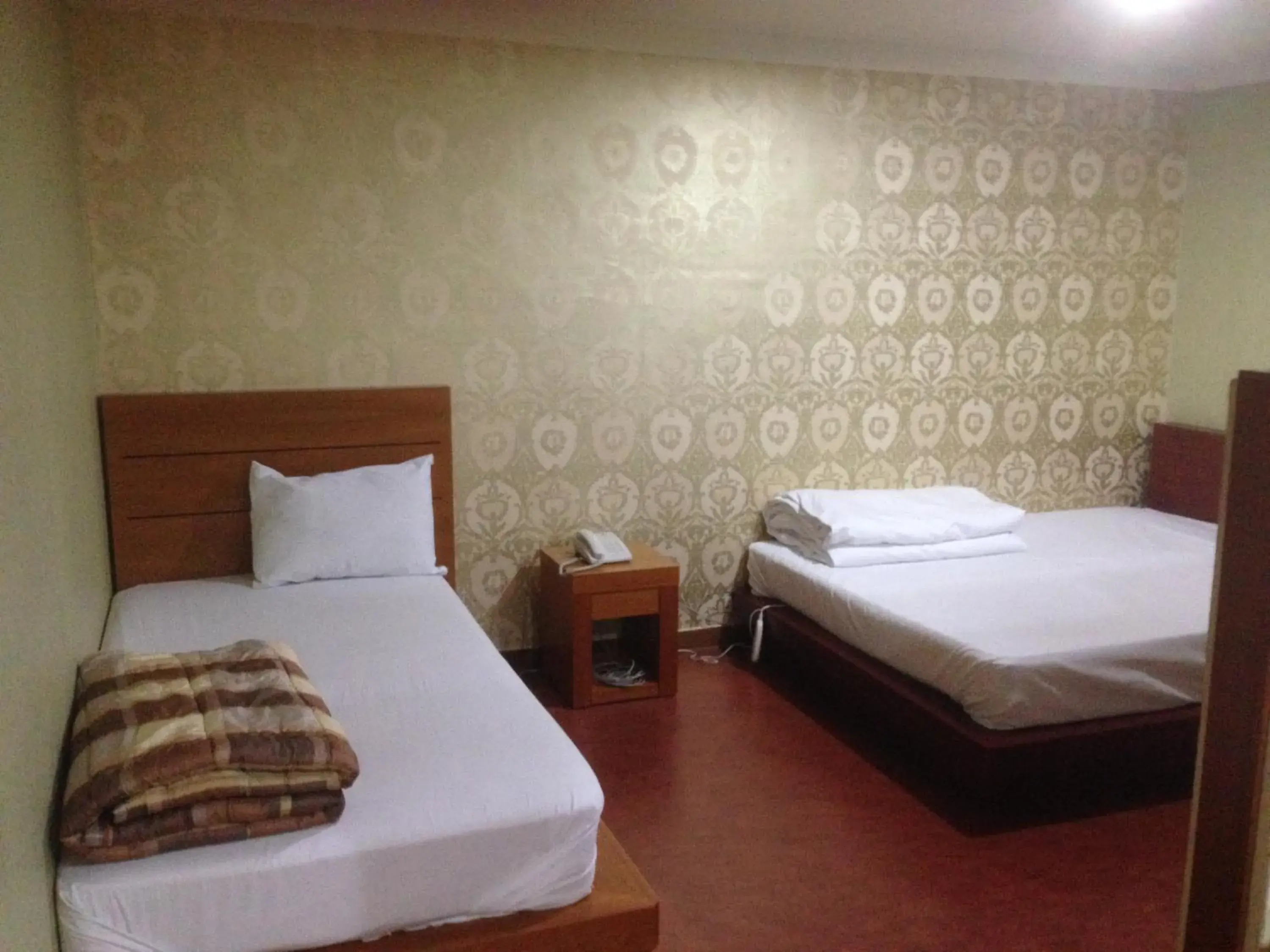 Bed in Goodstay Herotel