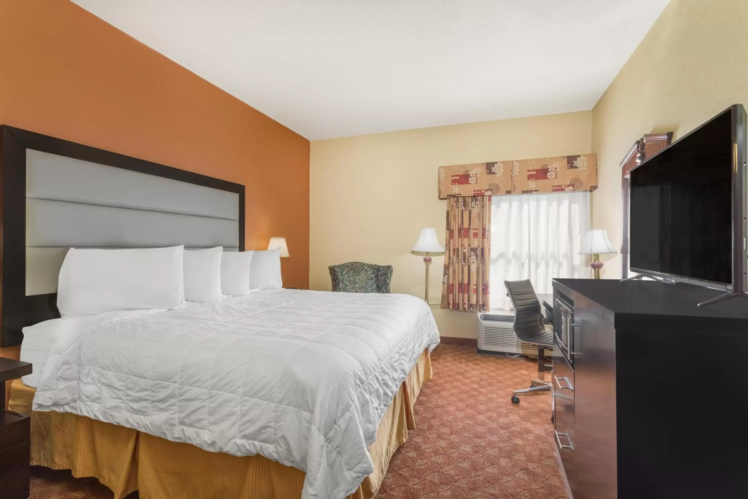 Bed in Baymont by Wyndham Fayetteville