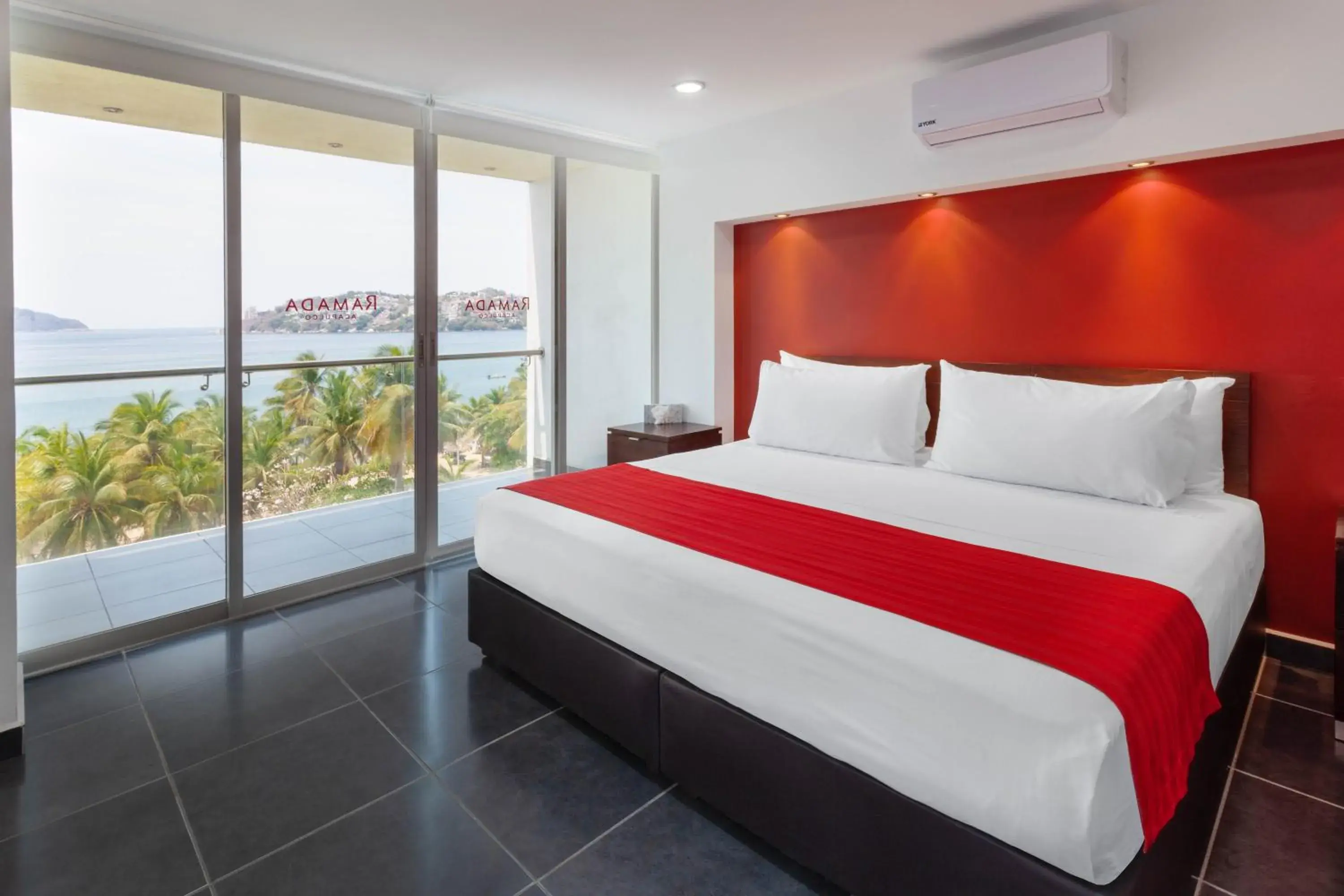 Bedroom, Bed in Ramada by Wyndham Acapulco Hotel & Suites