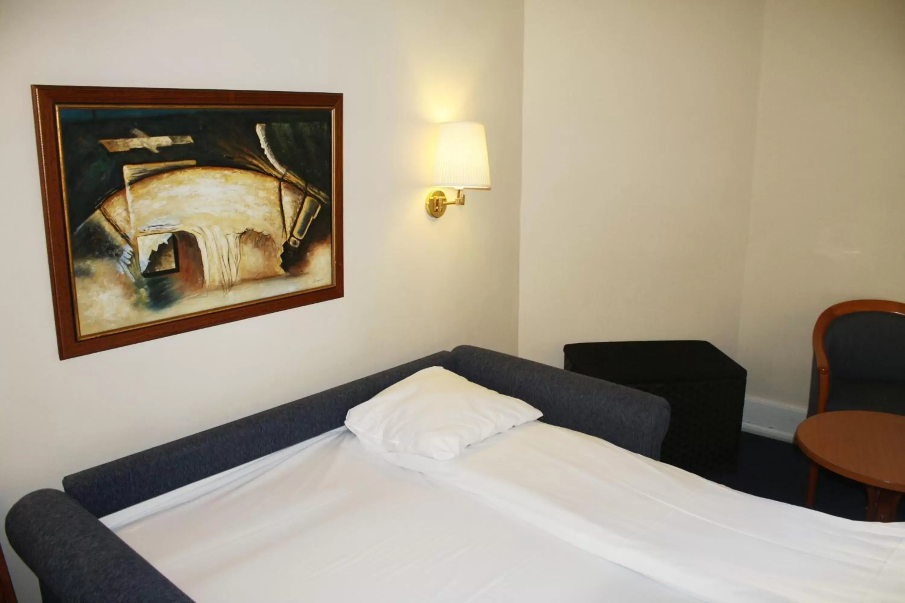 Bed in City Hotel Nebo