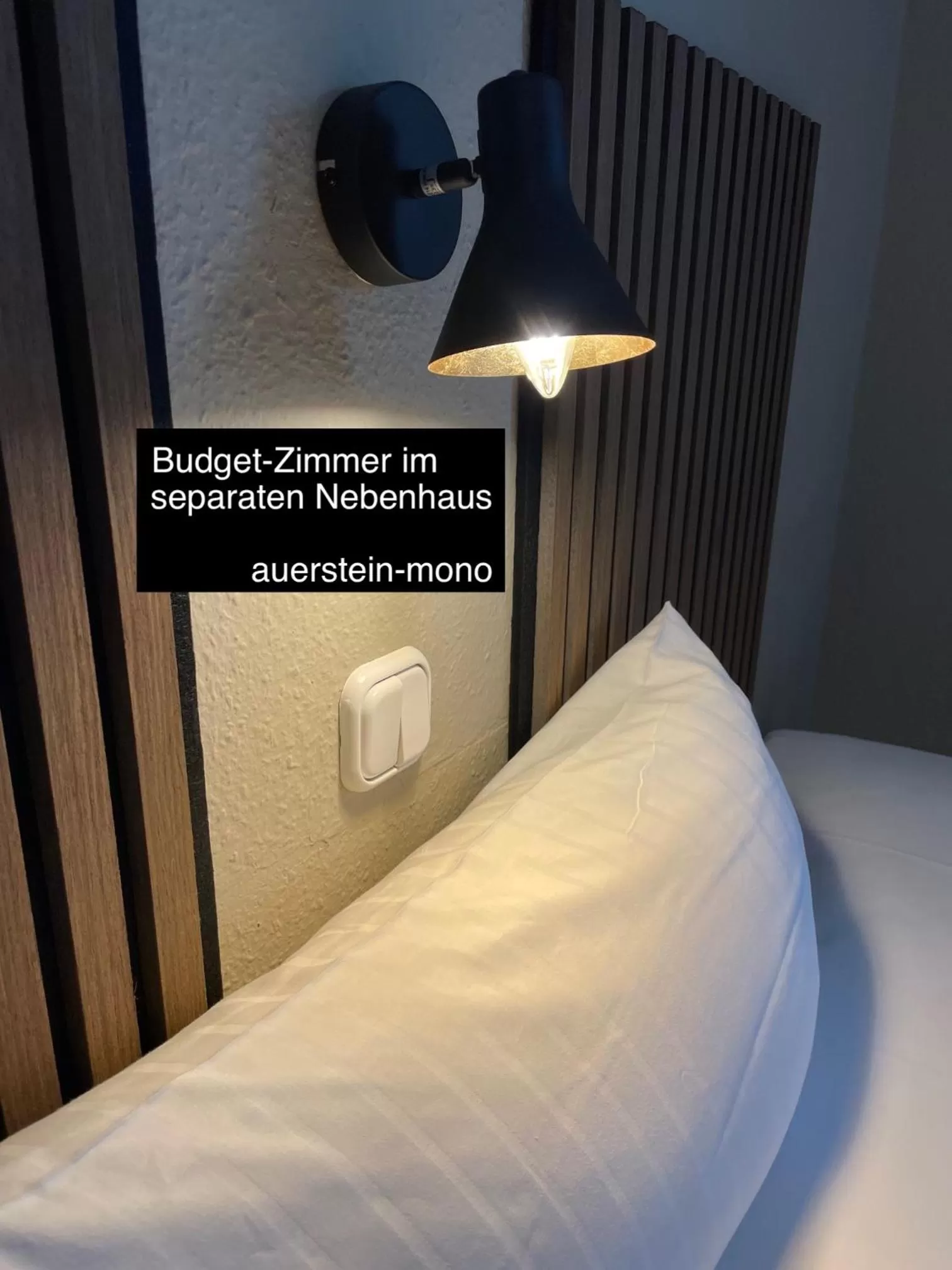 Bed in AUERSTEIN-Hotels auerstein & auerstein-mono