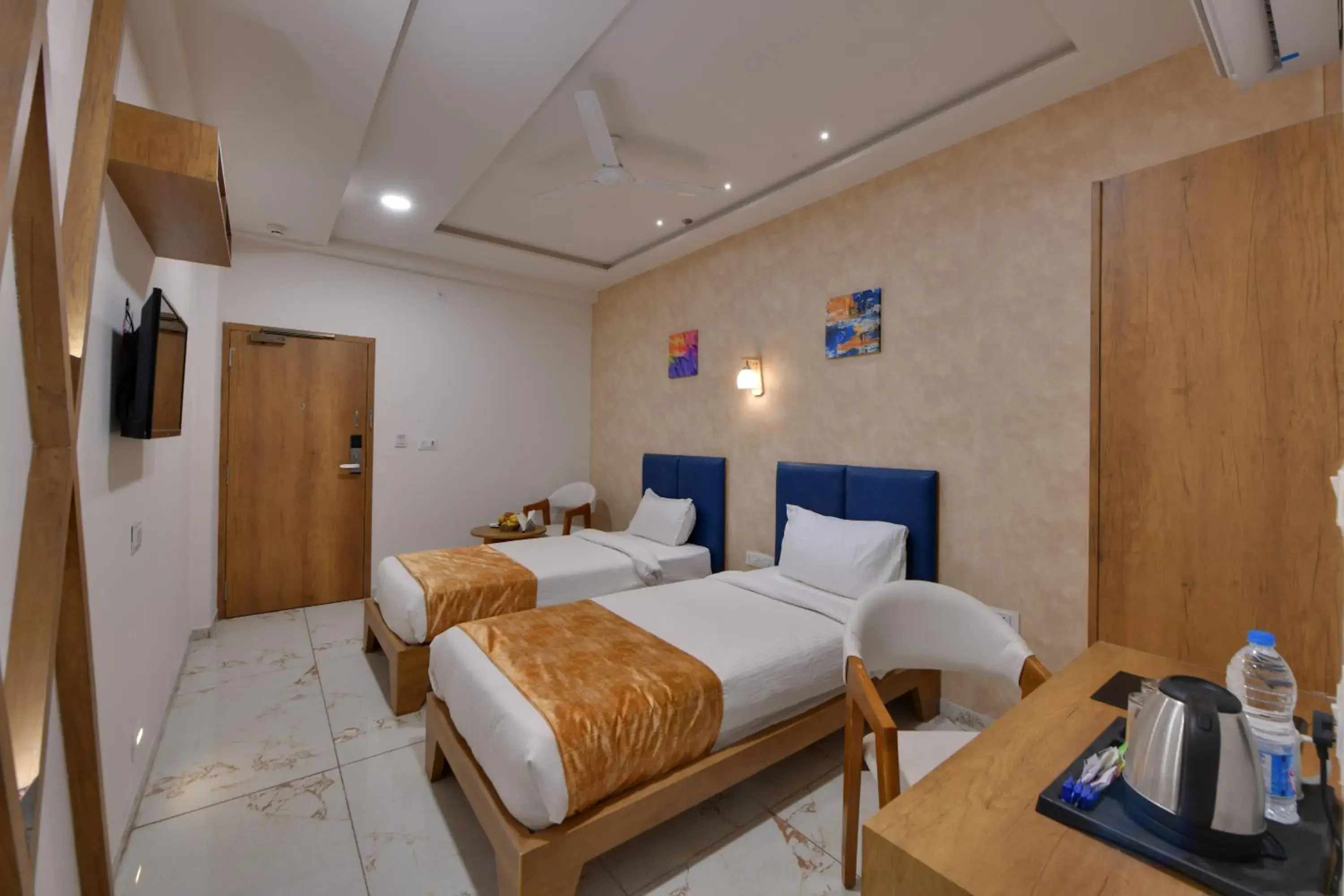 Bed in Click Hotel Tulsi