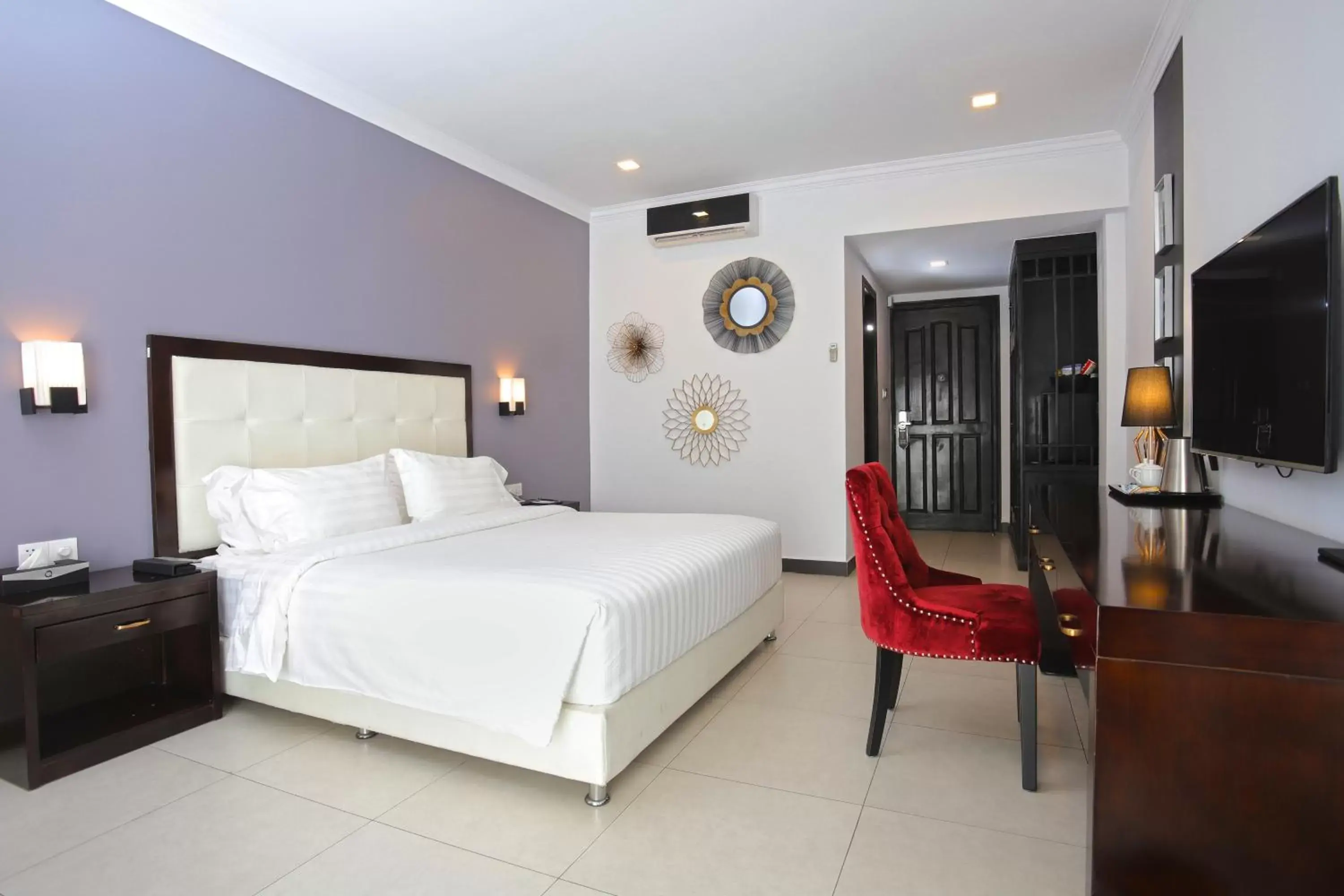 Bed in Queenco Hotel & Casino