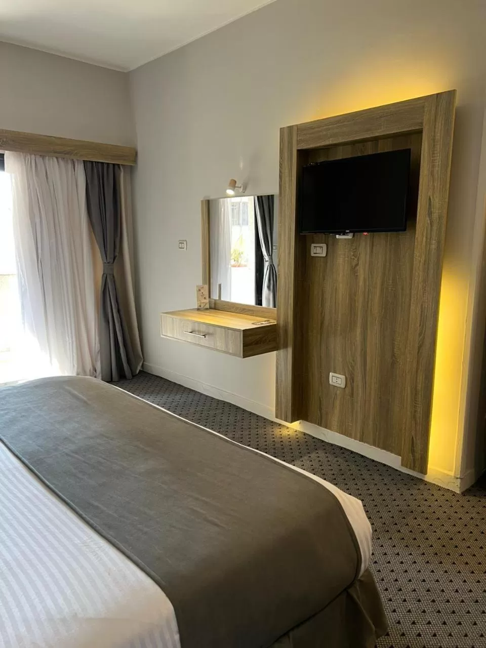 Bed in Atlas International Hotels