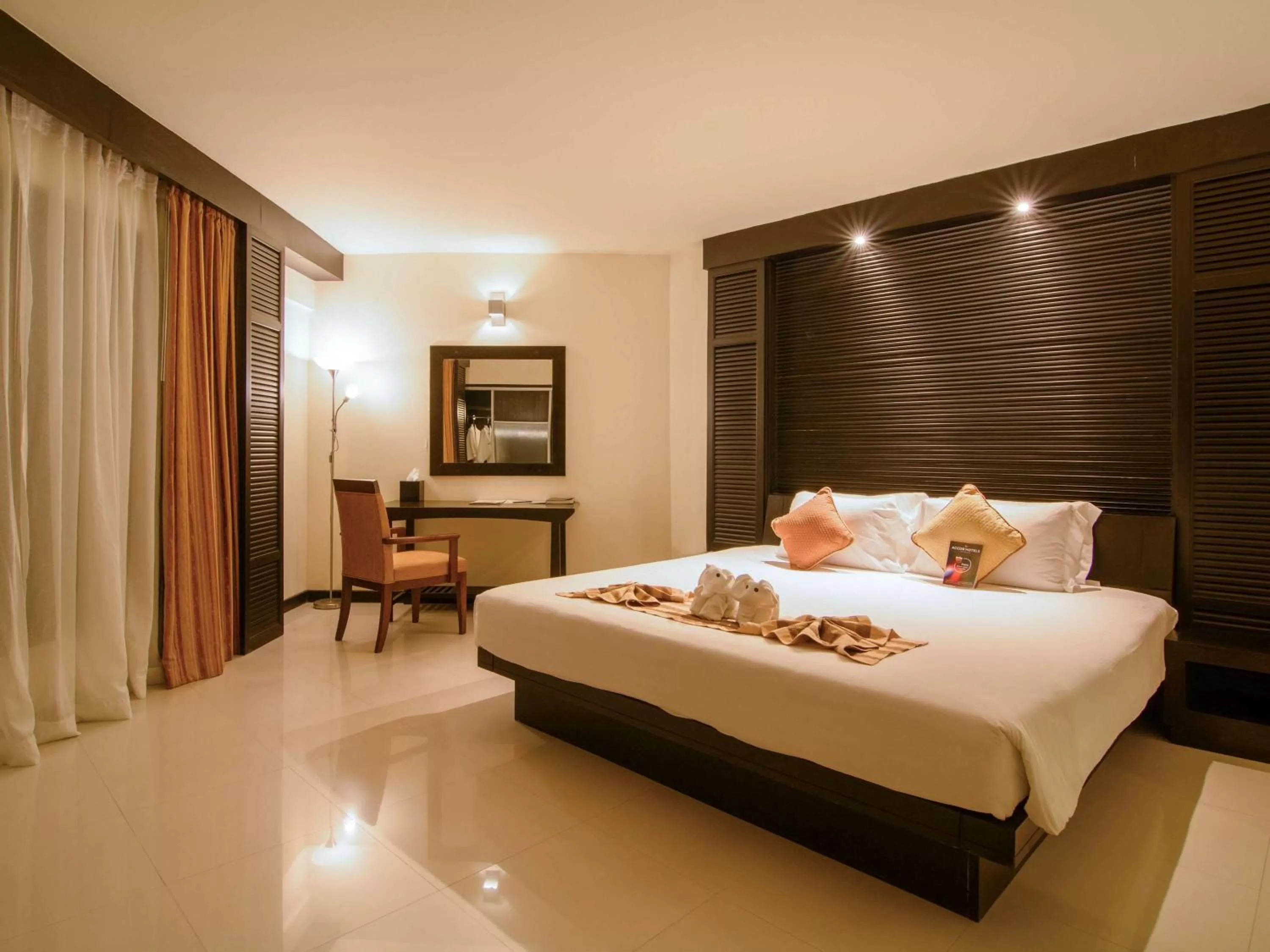Photo of the whole room, Bed in The Nouveau Chumphon Beach Resort And Golf