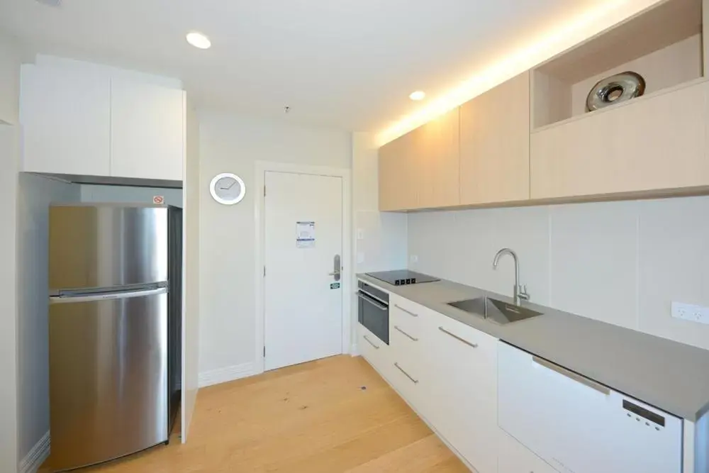 Kitchen/Kitchenette in West Fitzroy Apartments